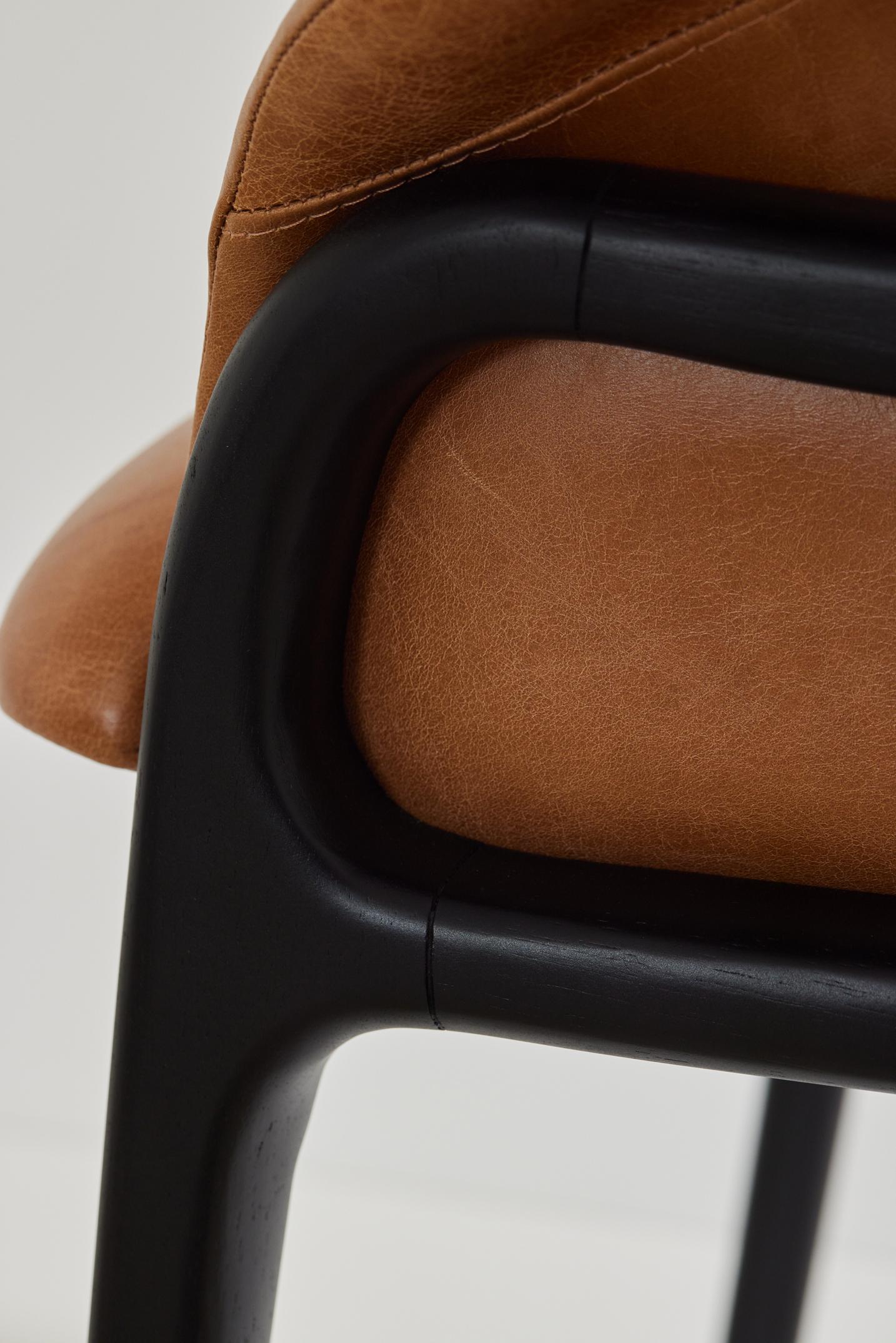 Contemporary Minimalist Organic Chair in black Solid Wood, camel leather Seating tone For Sale