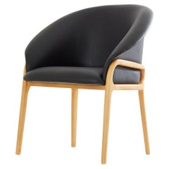 Chaise organique minimaliste en Wood Wood naturel, assise en cuir noir