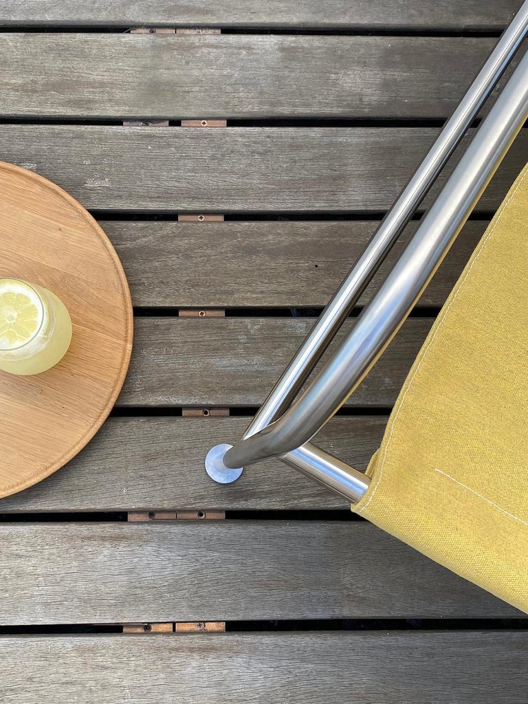 Curated visual reference: Minimalist Outdoor Lounge Chair In Slate Fabric And Brushed Stainless Photo Inspiration
