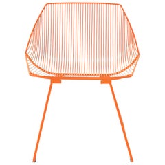 Minimalist Outdoor Wire Lounge Chair, the Bunny Lounge in Orange