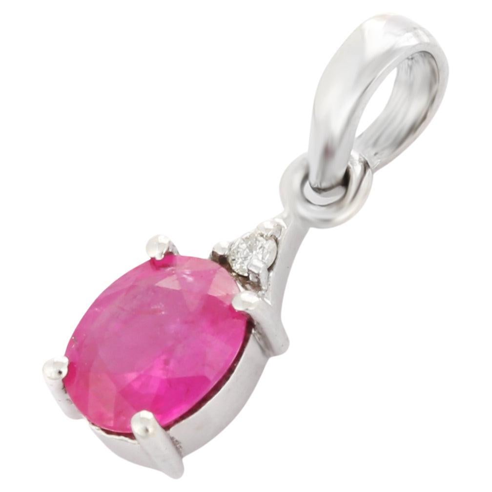 Charming Oval Ruby Pendant with Diamond Set in 14K White Gold For Sale