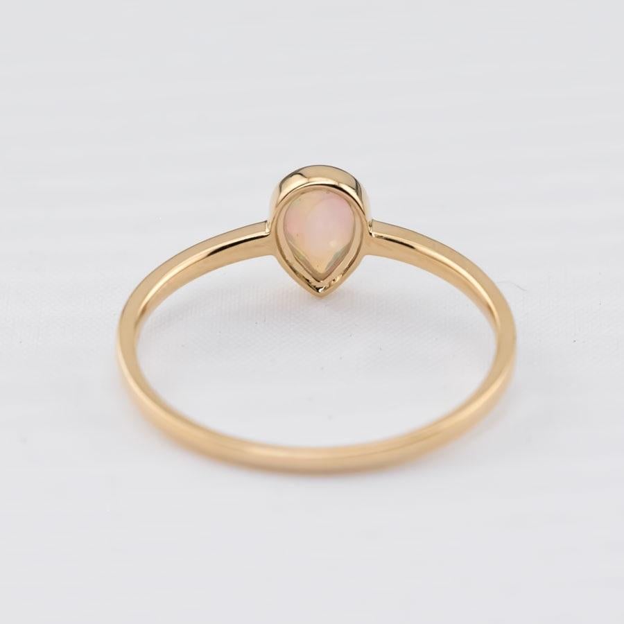 Arts and Crafts Minimalist Pear Shaped Natural Australian Solid Opal Ring 14k Yellow Gold For Sale