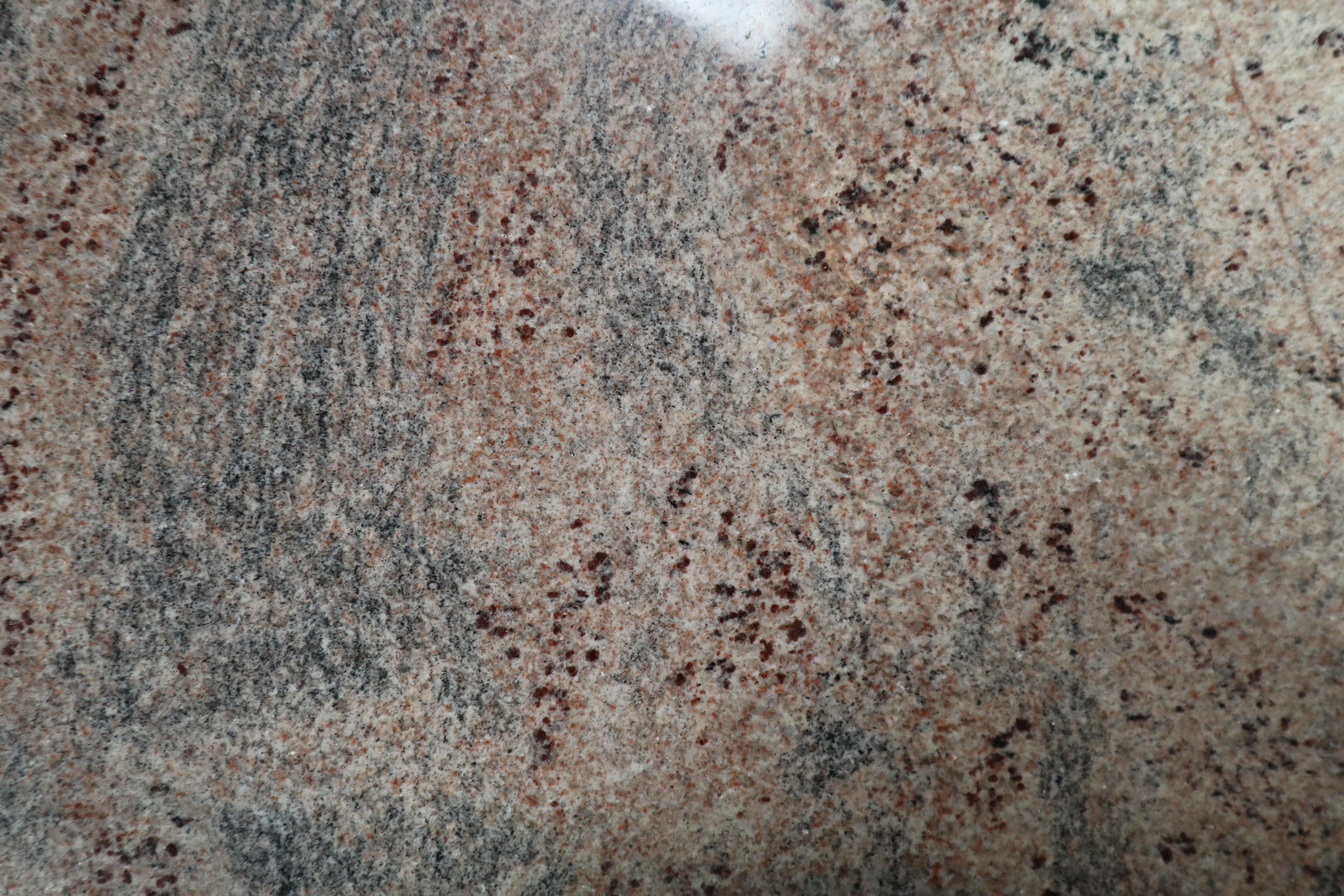 Minimalist granite coffee table. Pink veined slim coffee table.
In excellent condition, the stains are original in the top as this is a natural product.