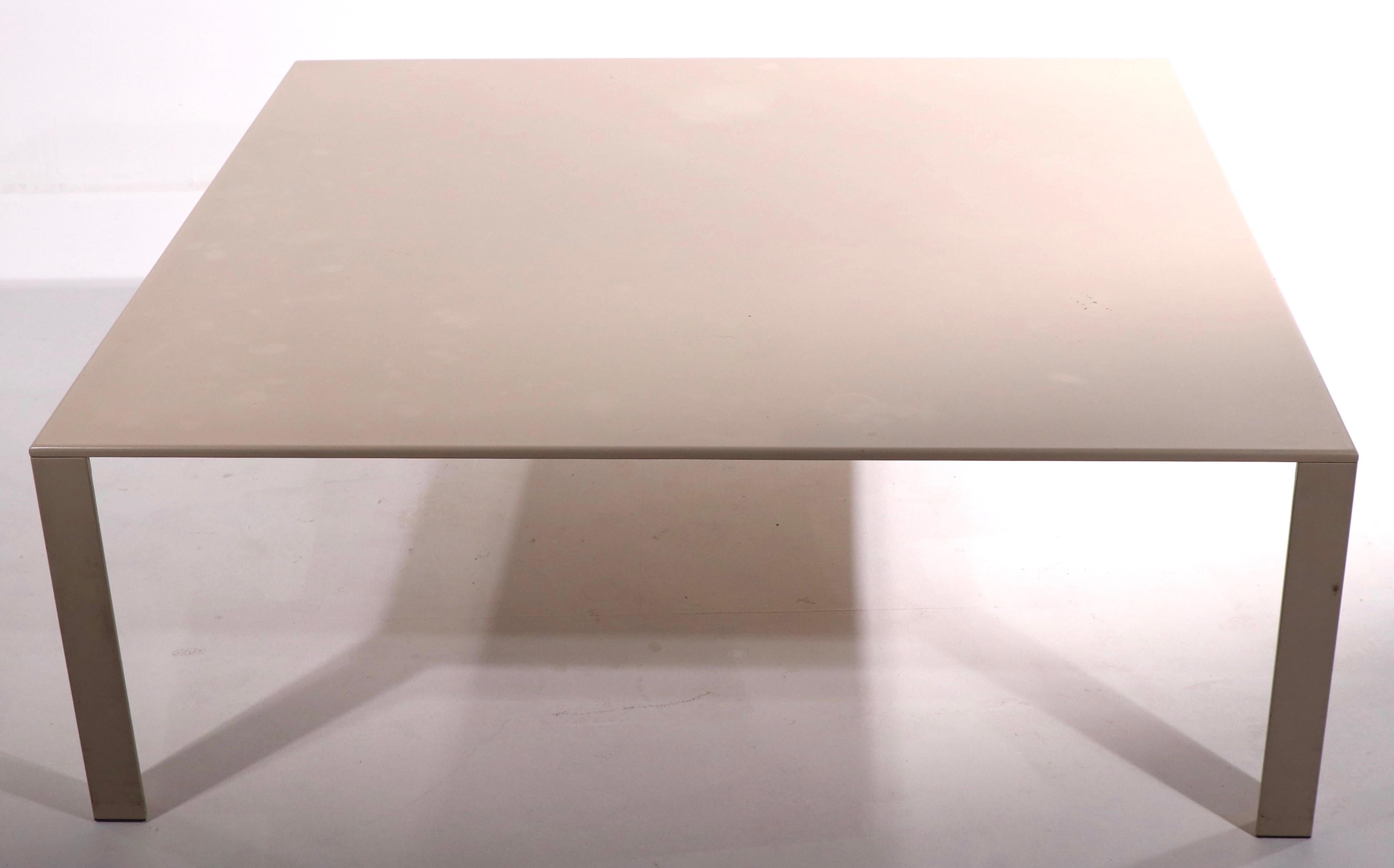 Chic architectural coffee table attributed to Saporiti. This sophisticated table is constructed of painted steel, it is square with angle corner legs. Very heavy and well constructed in the Minimalist, postmodern style, circa 1970/1980's. No