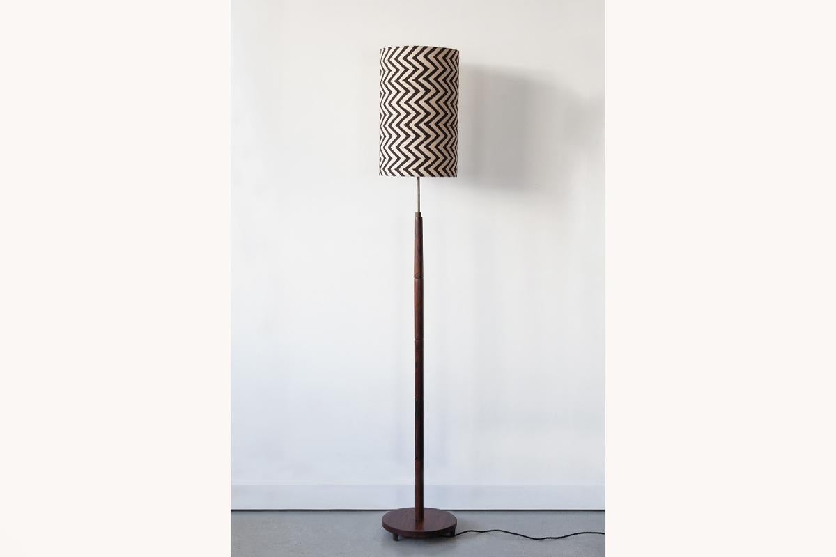 Minimalist Danish floor lamp in rosewood. Newly rewired and PAT tested. Shade sold separately. 

Dimensions: Height to bulb holder 125cm / Diameter of base 24.5cm 