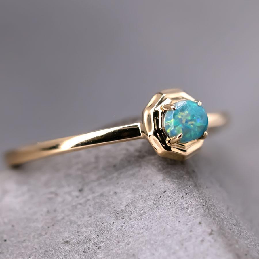 Minimalist Round Australian Black Opal Engagement Wedding Ring 18K Yellow Gold.


Free Domestic USPS First Class Shipping! Free Gift Bag or Box with every order!

Opal—the queen of gemstones, is one of the most beautiful gemstones in the world.