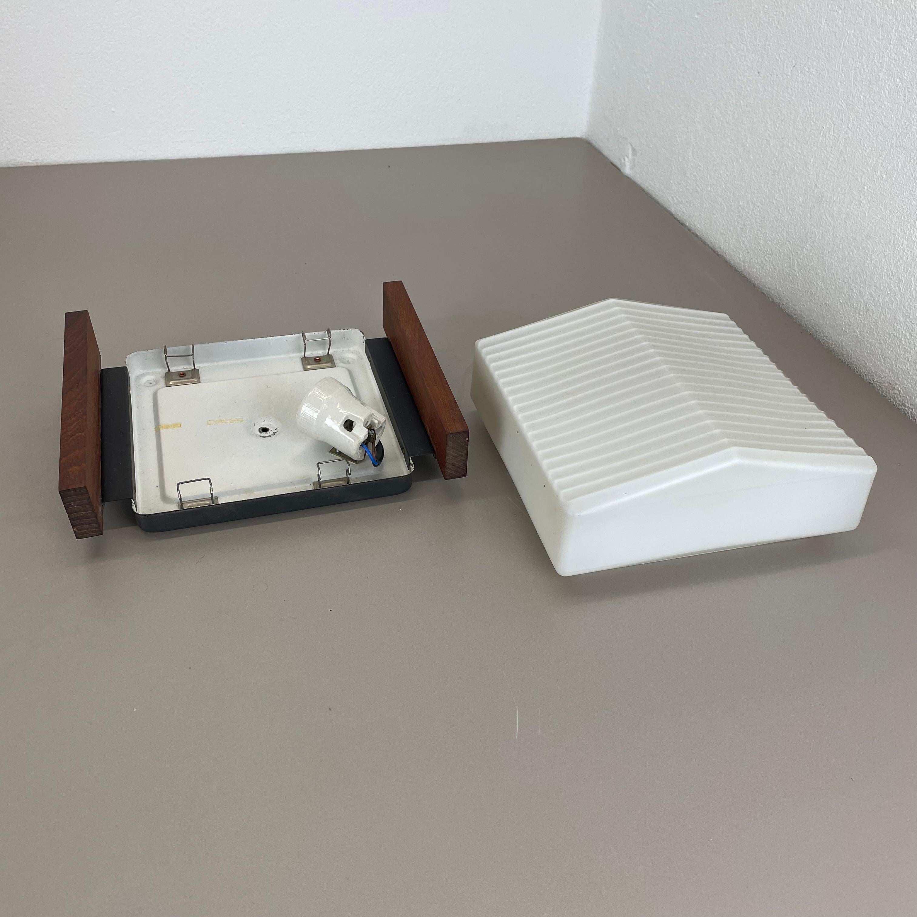 minimalist satin white glass and teak Wall Light by BEGA Lights, Germany 1960s For Sale 5