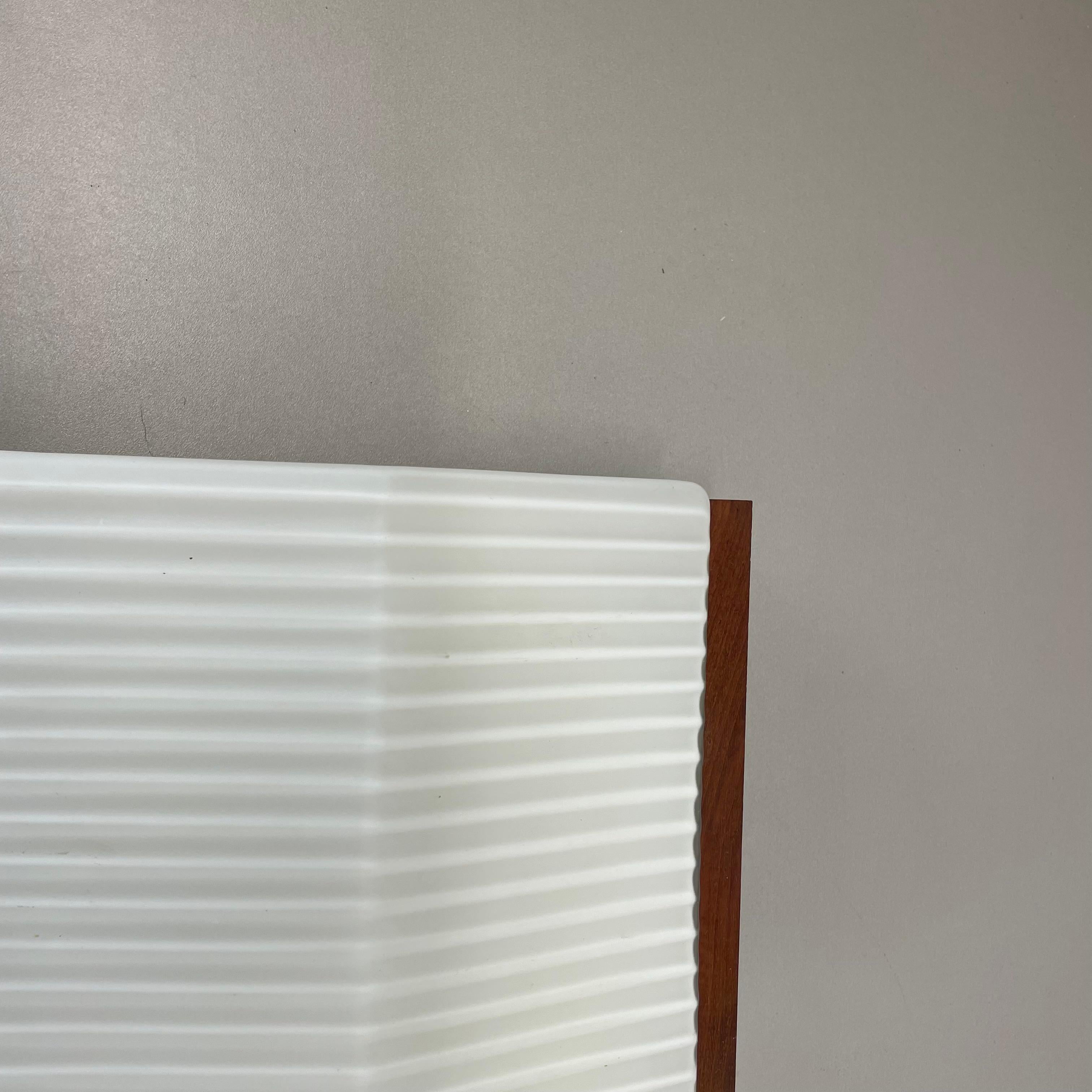 Metal minimalist satin white glass and teak Wall Light by BEGA Lights, Germany 1960s For Sale