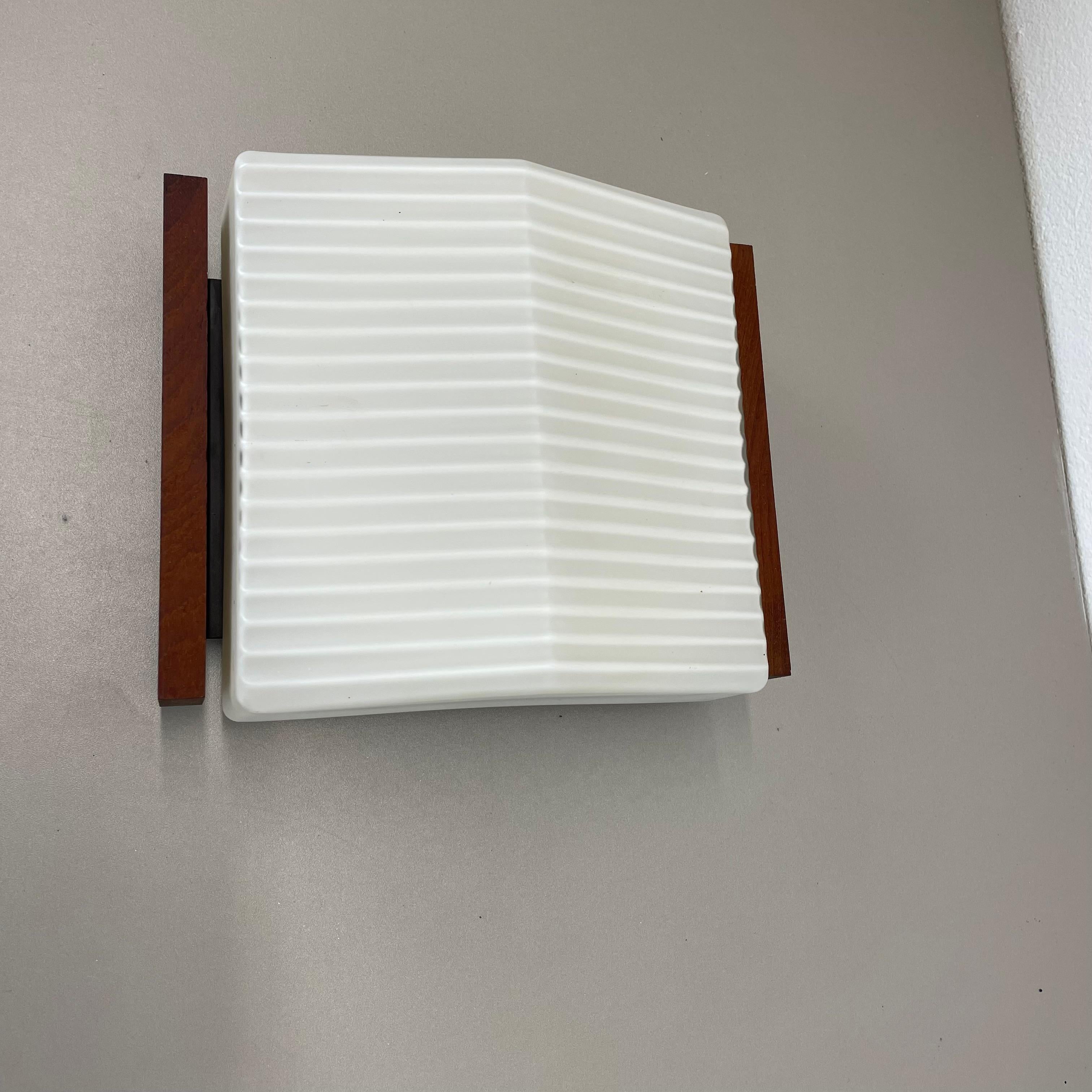 minimalist satin white glass and teak Wall Light by BEGA Lights, Germany 1960s For Sale 2