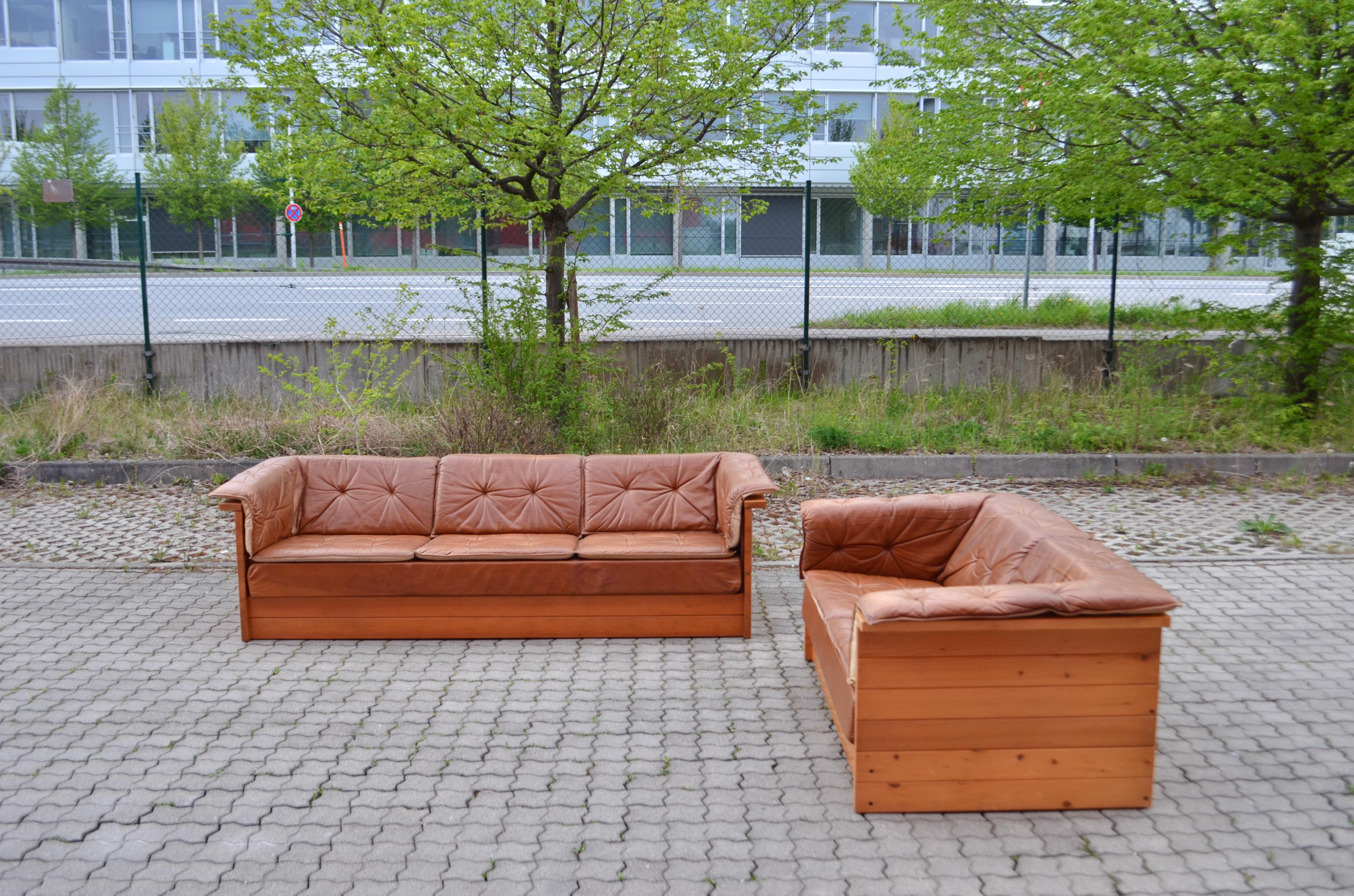 This minimalist sofa ensemble was manufactured in Scandinavia Sweden.
it contents a 3 seater Sofa and a 2 seater Sofa.
It has a beautiful solid scandinavian pine frame.
All details are minimalistic and pure.
The loose cushions are made like pads