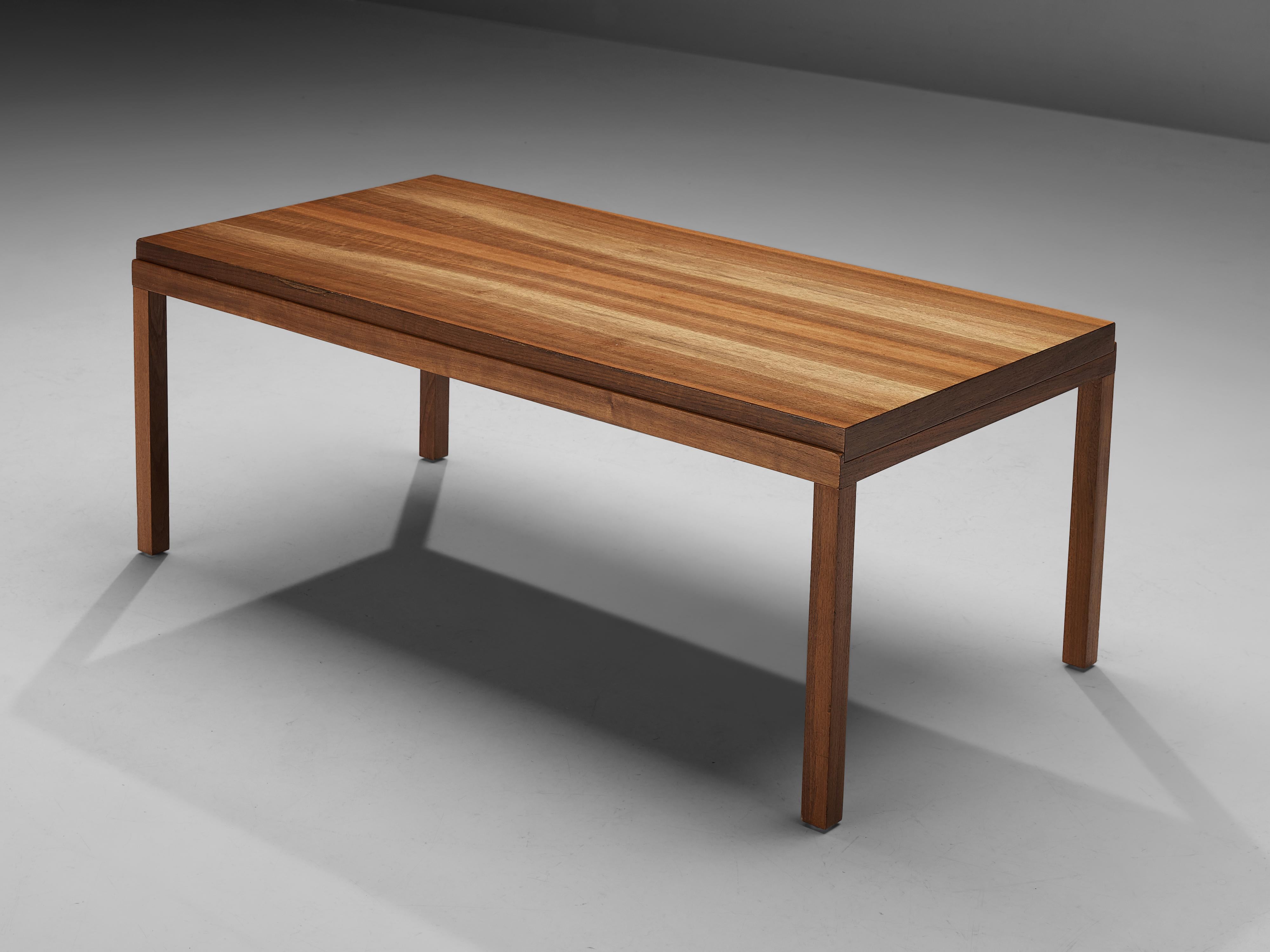 Coffee table, walnut, Scandinavia, 1980s

Minimalistic side table in walnut. This rectangular coffee table shows stunning lines due to the sleek legs of the design. Thanks to the beautiful grain of the walnut, the lines of the design are emphasized.