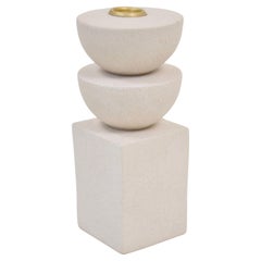 Minimalist sculptural candleholder with stacked geometric forms