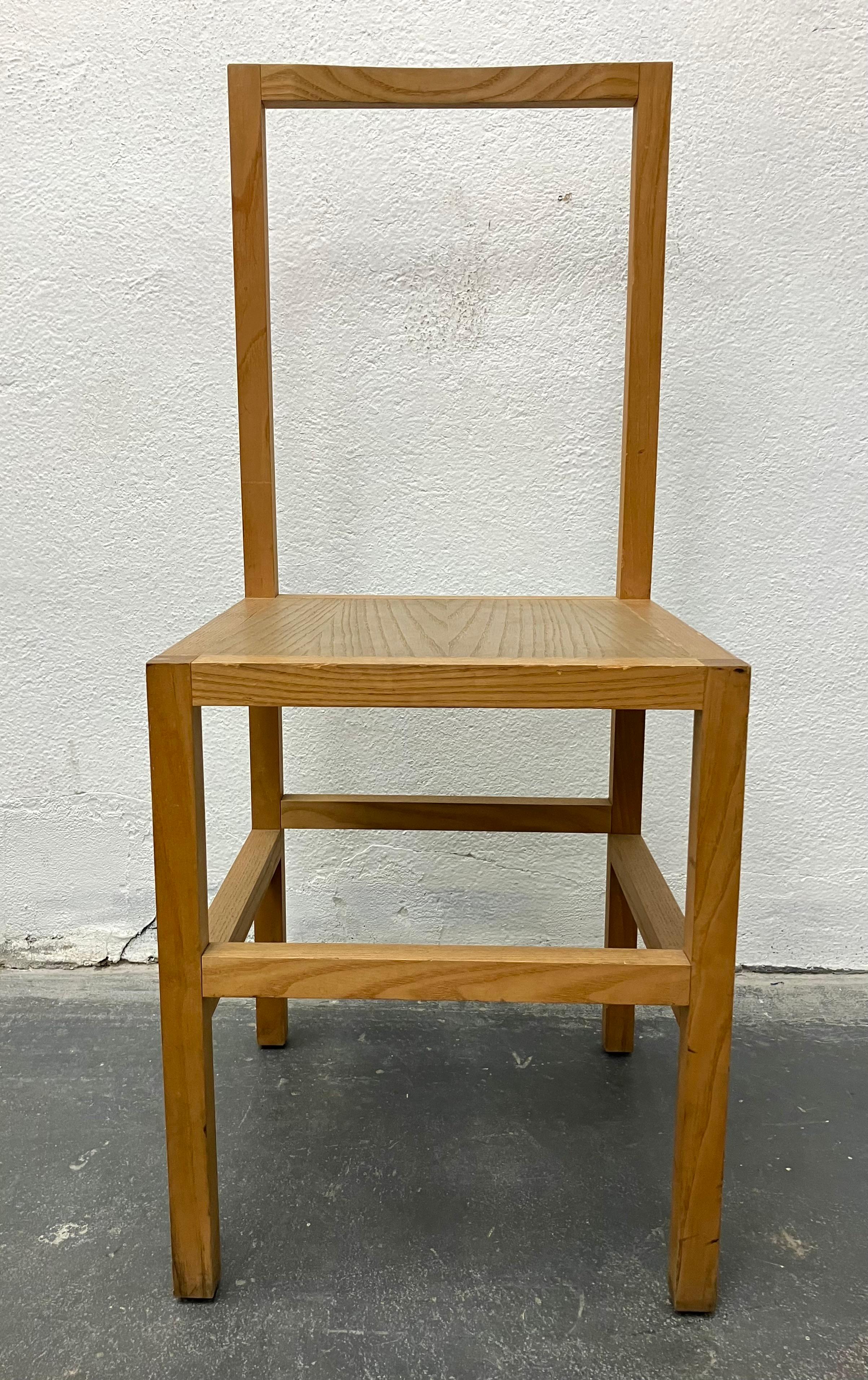 Simple architectural lines in solid Douglas fir belies refined detailing and construction, such as subtle carved edge-shaping in the seat and backrest, circa 1980s. Unmarked, but reminiscent of the work of Donald Judd.  
