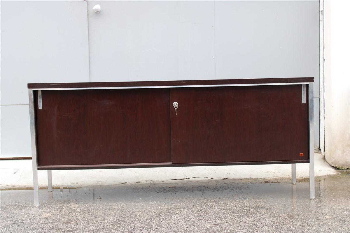 Minimalist sideboard in wood and metal parts tecno 1970 Italia, 

two sliding doors with two shelves inside as shown in the photo.