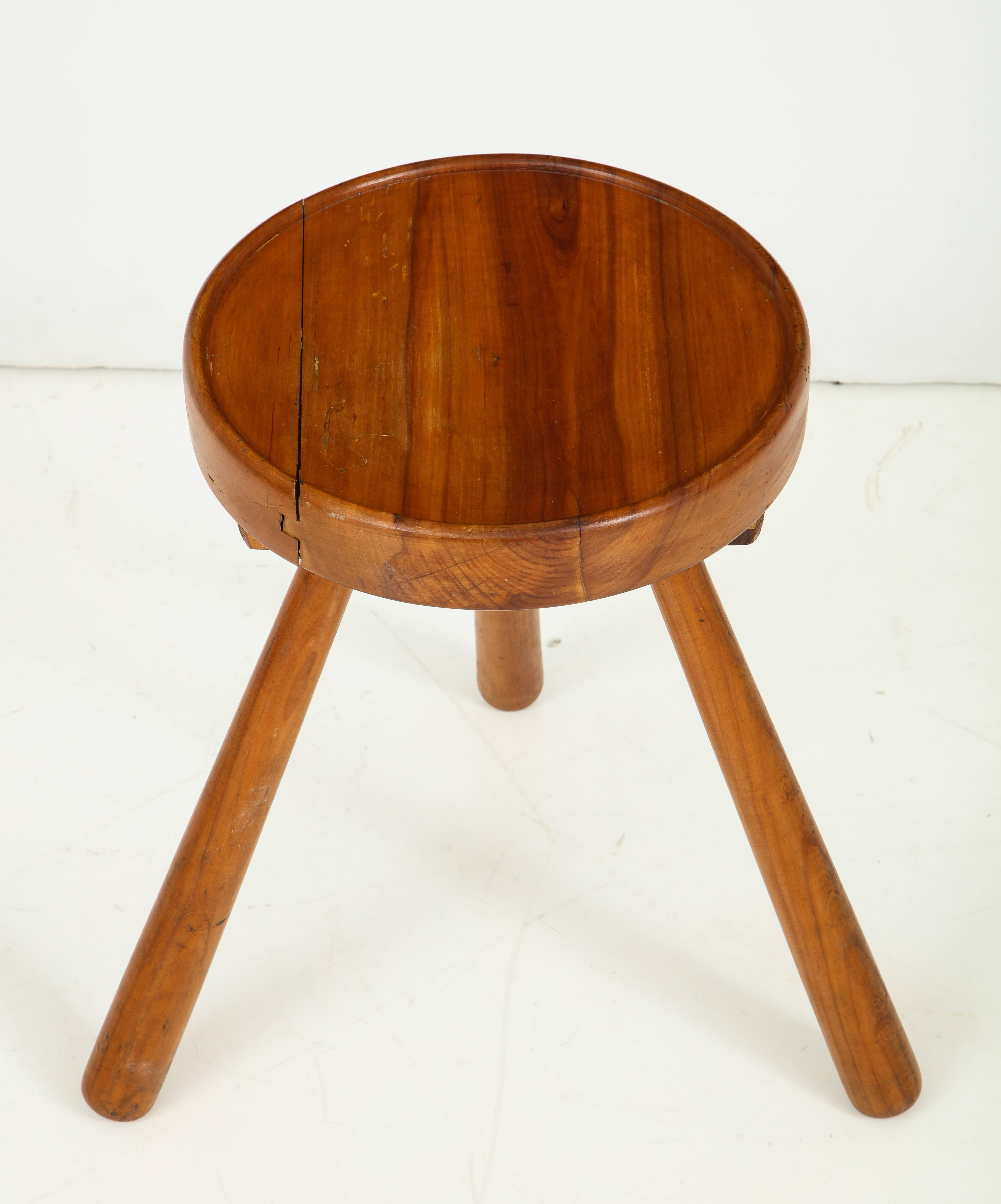 wooden tripod stool