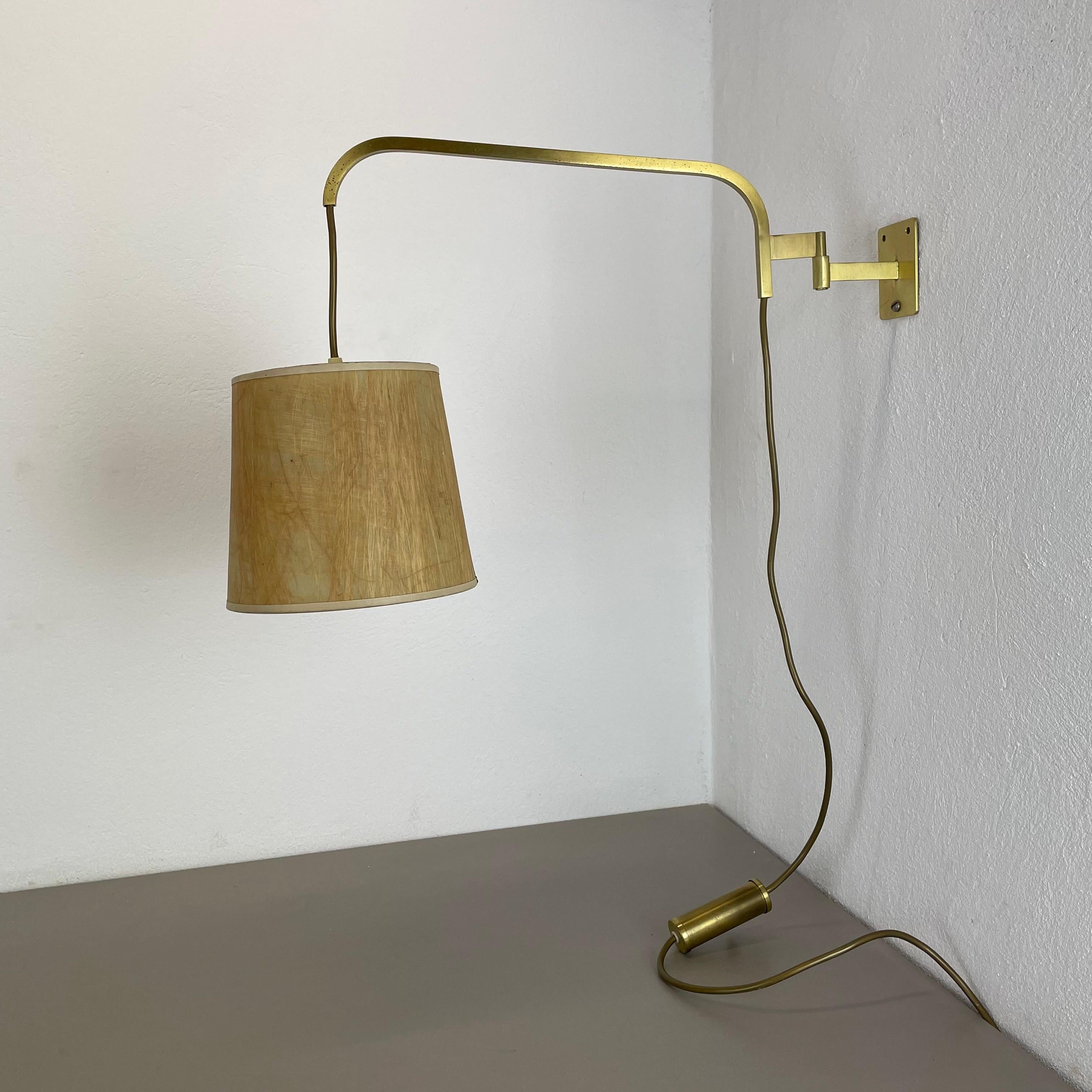 Article:

Wall light 


Origin:

Italy


Decade:

1960s





This wall light was designed and produced in Italy in the 1960s. The wall fixation of this light and the large light arm with fixation for the shade are made of solid