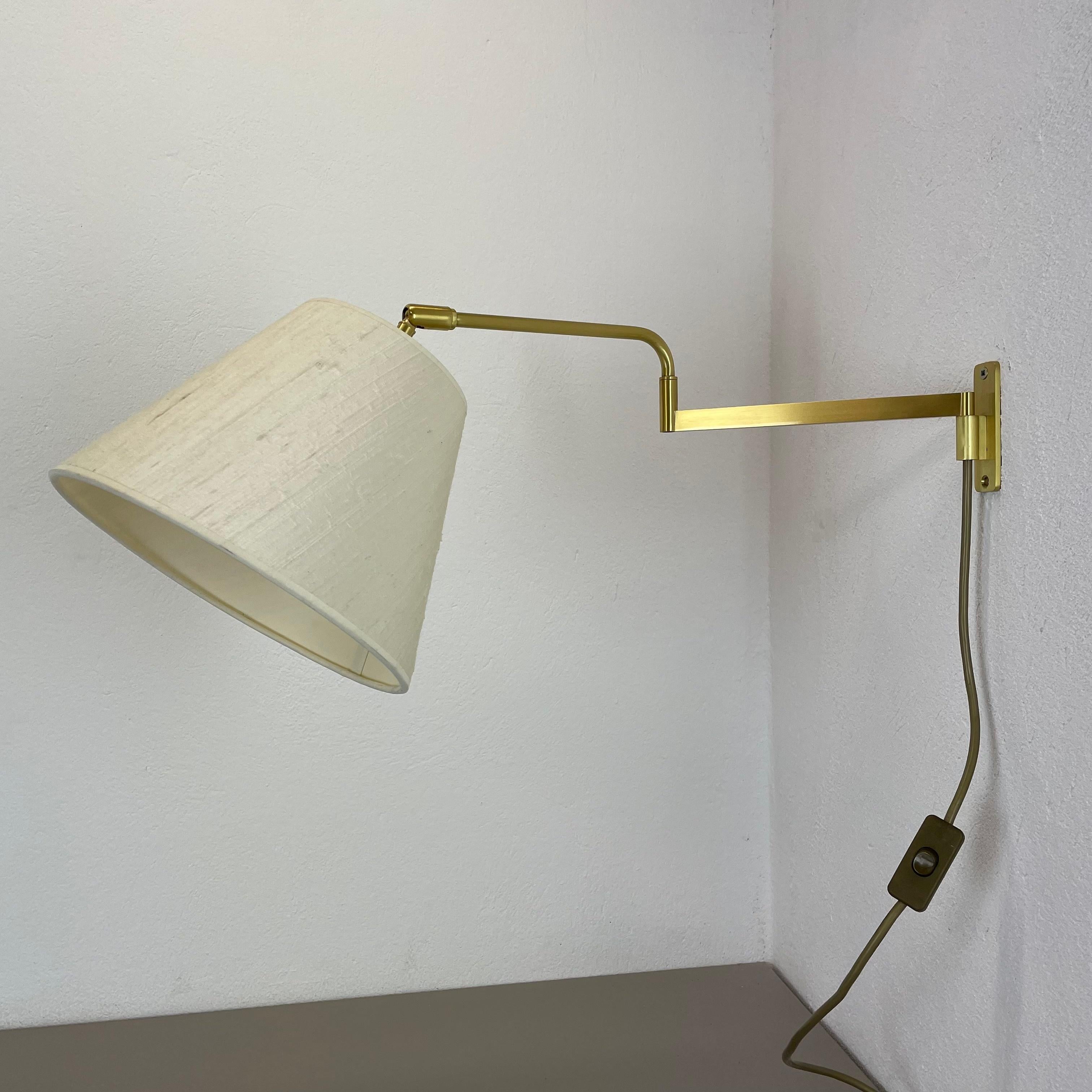 Article:

Wall light 


Origin:

Italy


Decade:

1970s



This wall light was designed and produced in Italy in the 1970s. The wall fixation of this light and the large light arm with fixation for the shade are made of solid brass.