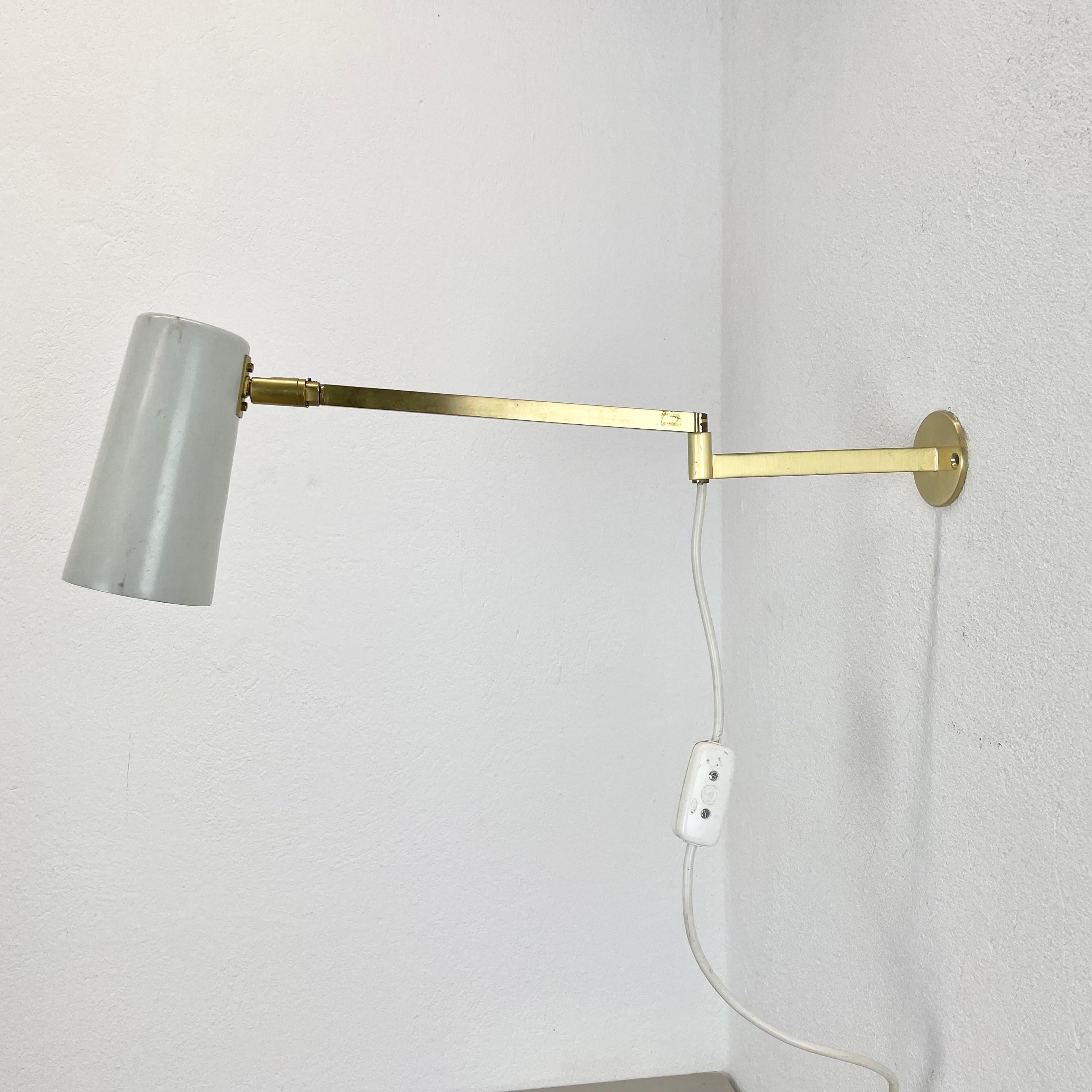 Article:

Wall light 


Origin:

Italy


Decade:

1970s



This wall light was designed and produced in Italy in the 1970s. The wall fixation of this light and the large light arm with fixation for the shade are made of solid brass. The light comes