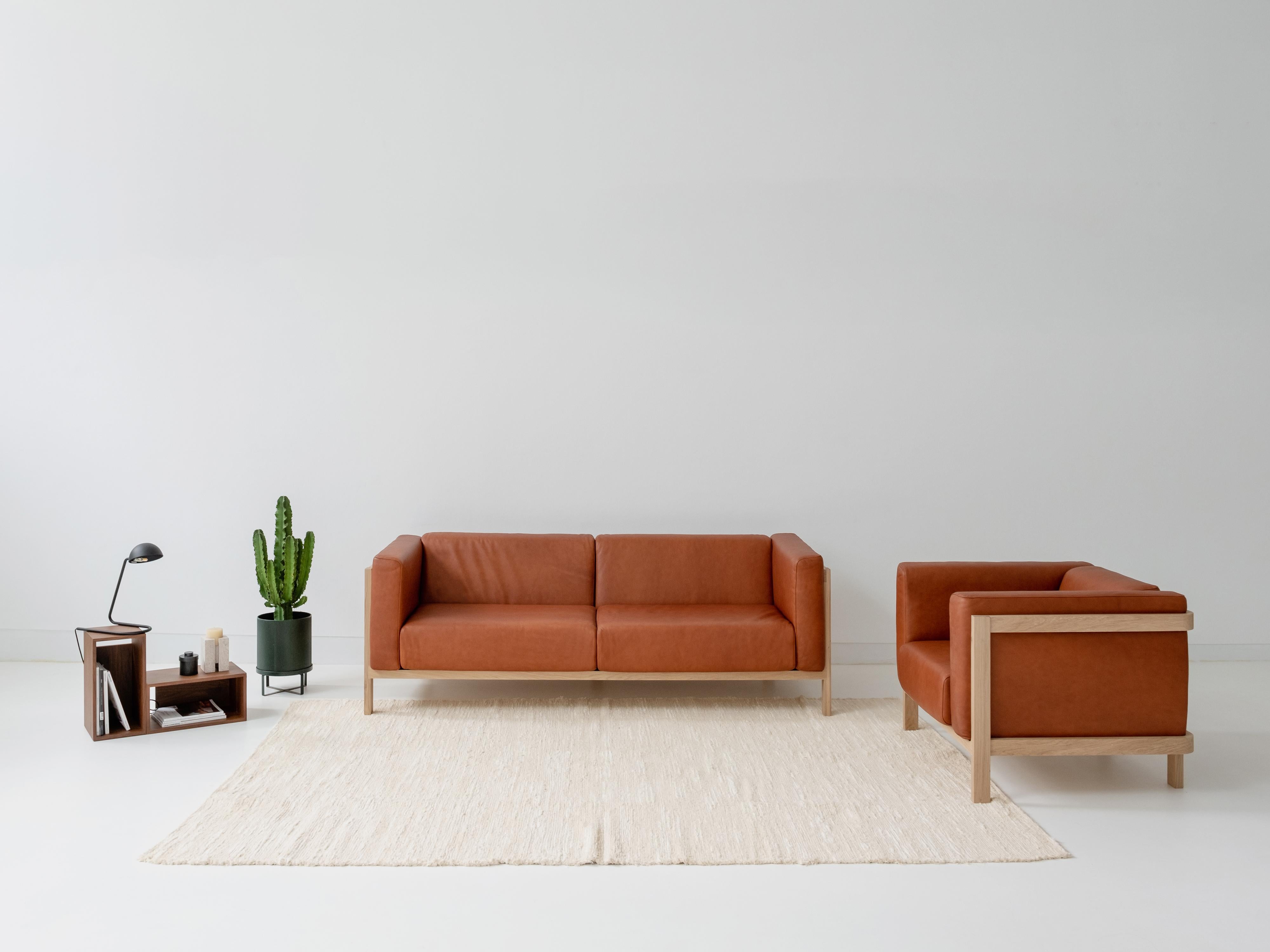 Modern Minimalist three seater sofa walnut - leather upholstered For Sale