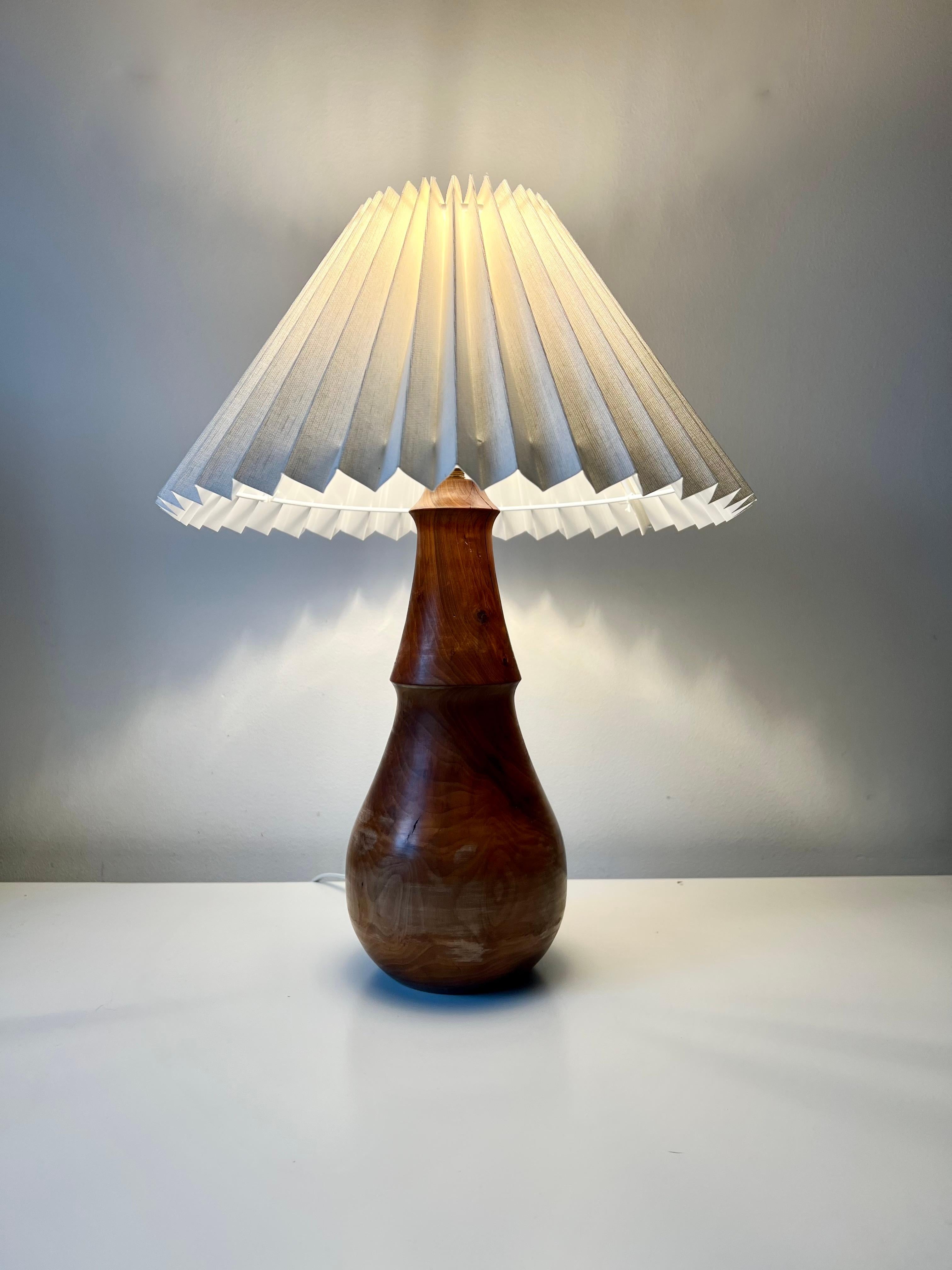 Minimalist turned wood table lamp with linen pleated shade 3