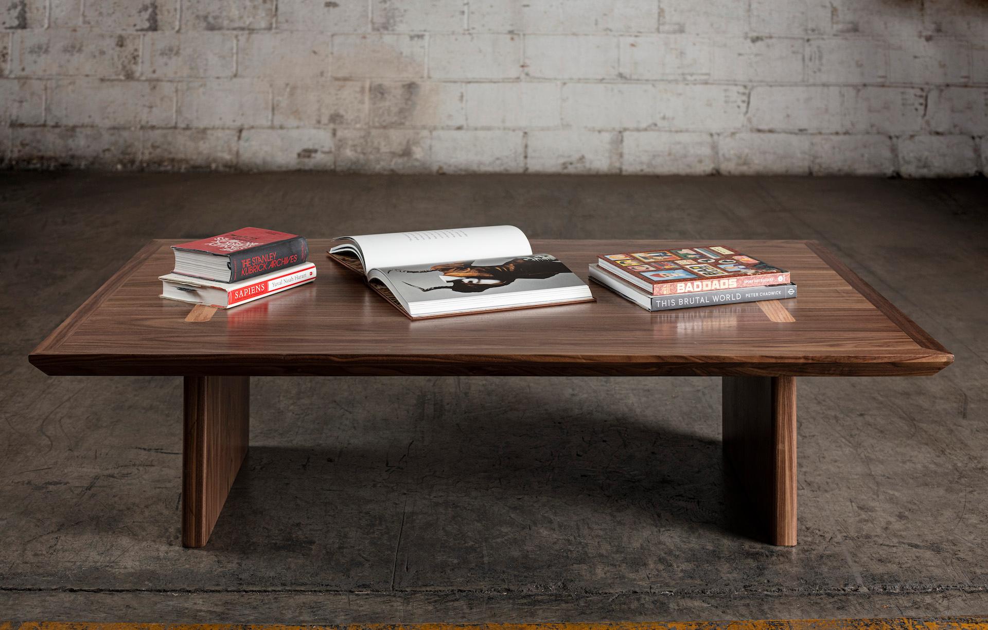 This modern, minimalist and aesthetic coffee table. Masterfully handcrafted of beautiful black walnut, it is a study in simplicity and finely tuned proportions.