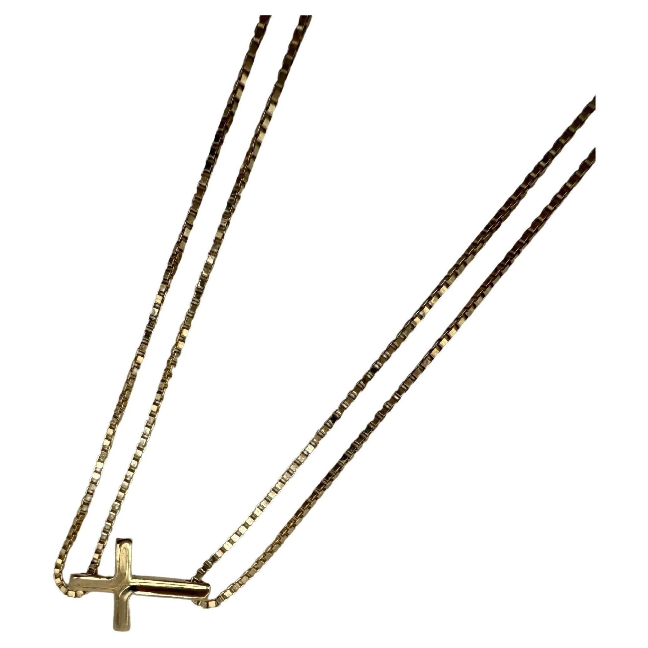 Collar cruz minimalista de oro amarillo 14KT