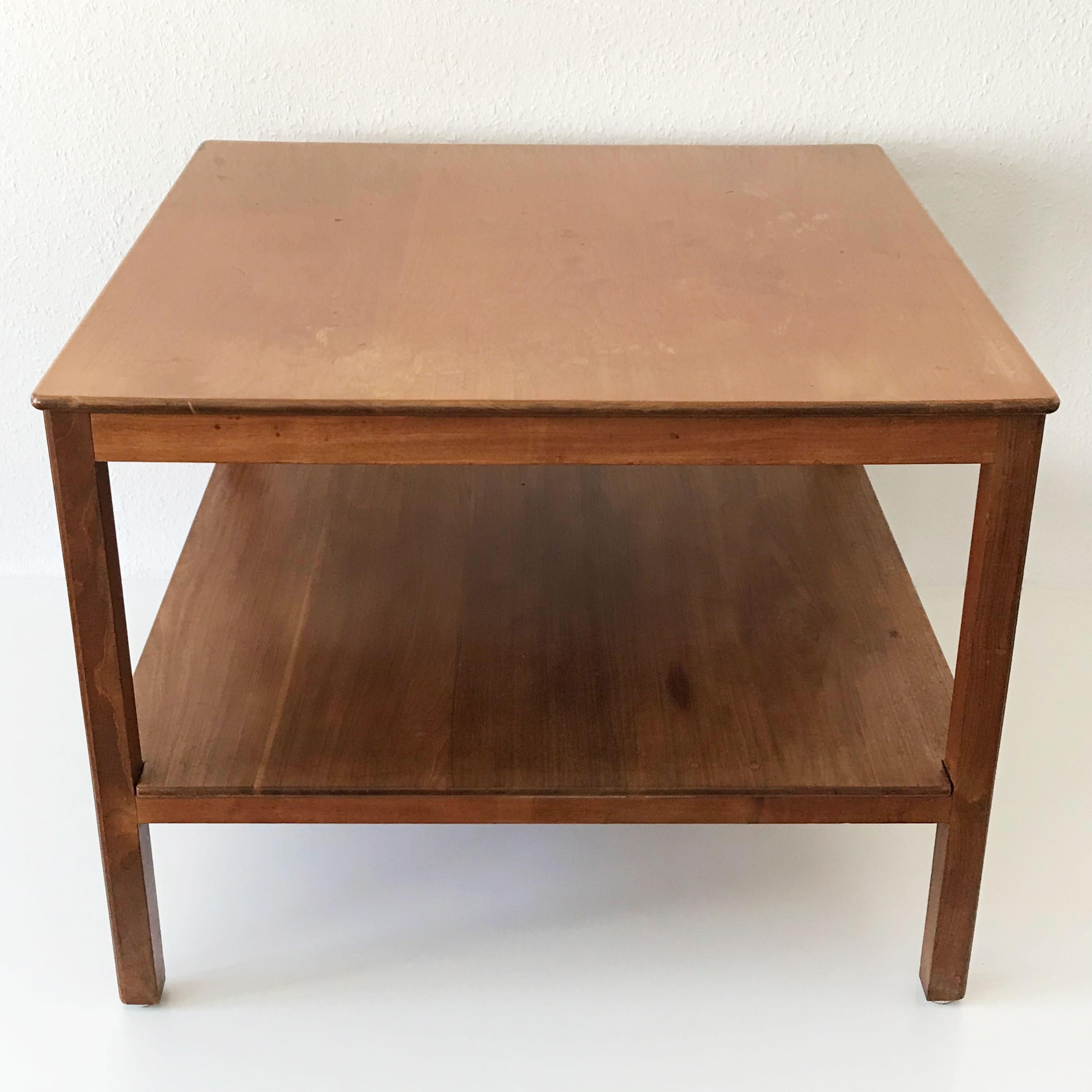 Exceptional coffee table in a minimalistic design by Kaare Klint. 1932. Manufactured by Rud Rasmussen, Copenhagen, Denmark in 1934 (by Rud Rasmussen confirmed).
Makers label under the upper plate.

Executed in Cuban mahogany.

Dimensions:
H 21.07
