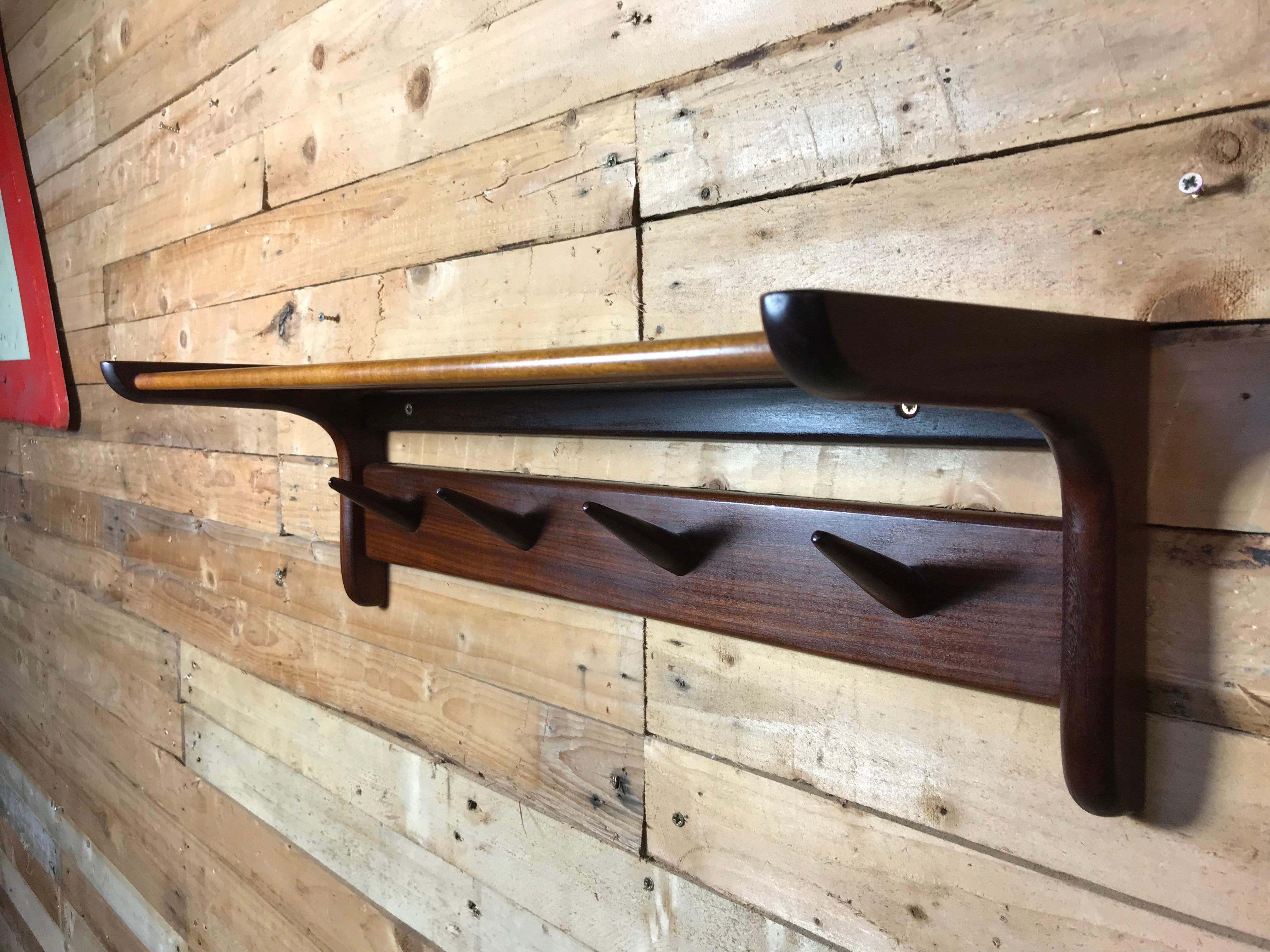 Minimalistic Dutch 1960s retro carved solid teak coatrack in mint condition.