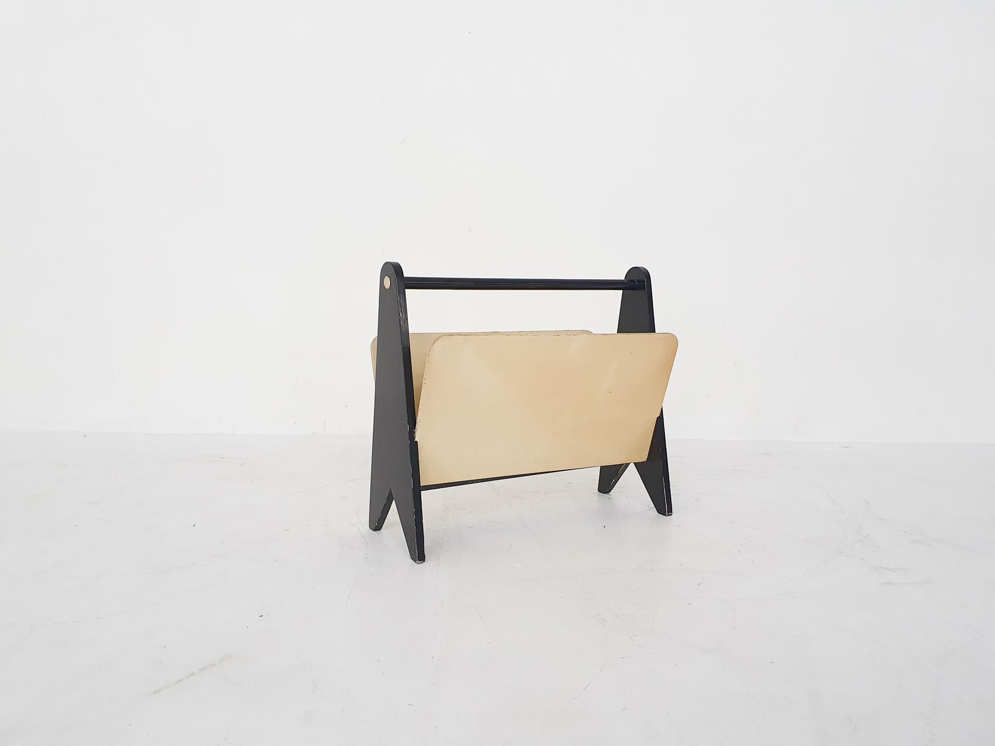 Black and white wooden magazine stand, designed in The Netherlands in the 1950's.