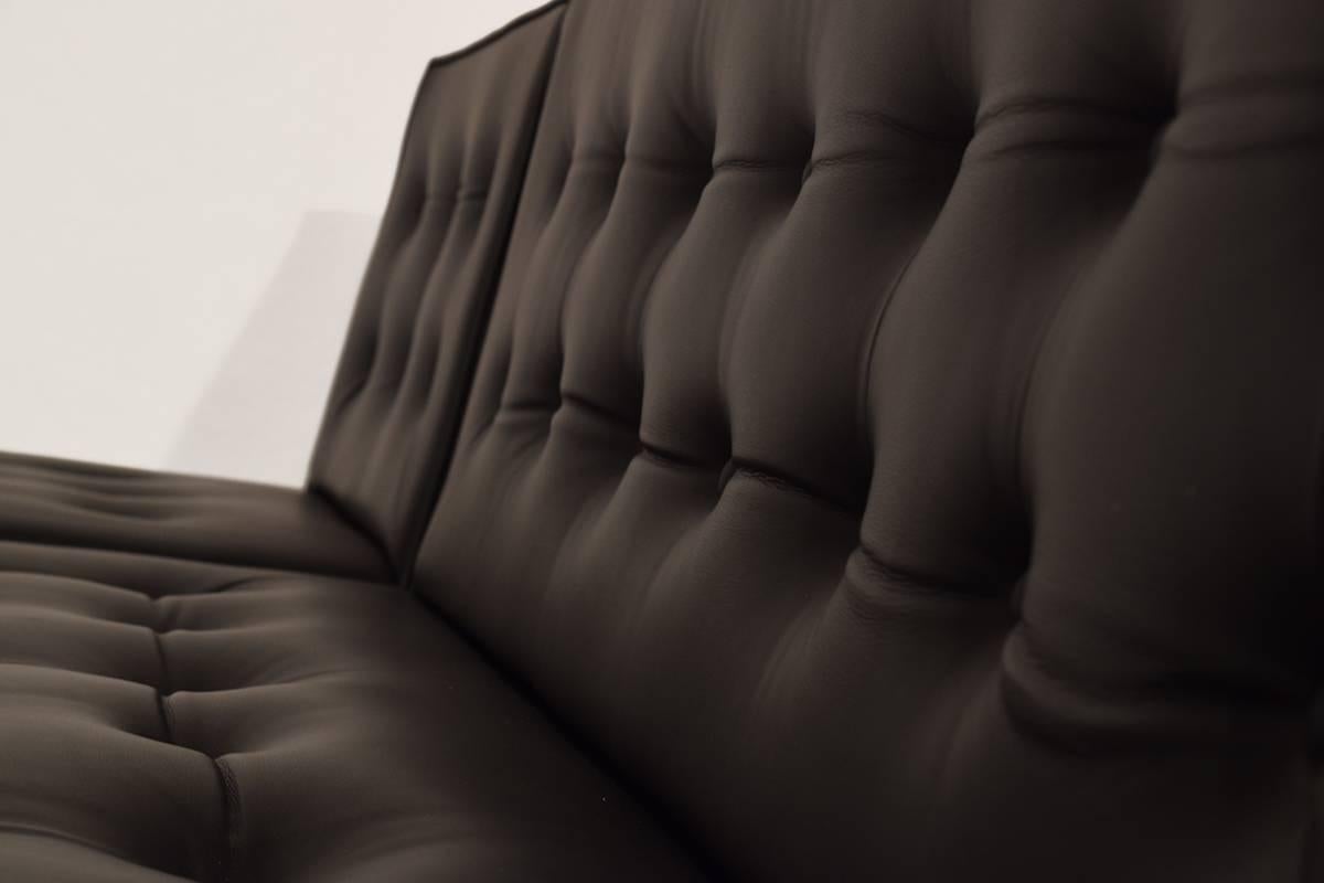 Exceptional minimalistic black leather lounge set named the '020' series and were designed by the Kho LIang Ie for Artifort in the Netherlands in 1958. This was the first minimalistic style made by Artifort. The design is after almost 60 years still