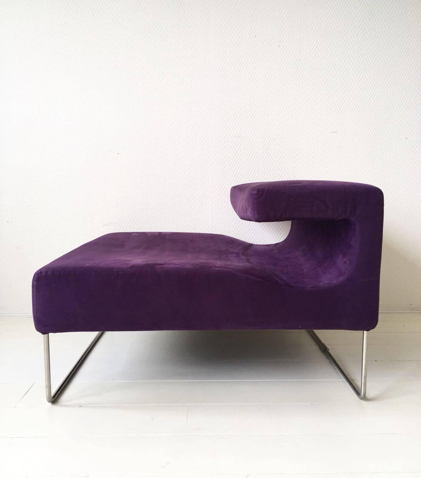These two futuristic and Minimalist chairs form together a sofa; one in pink/purple (corner model) and the other purple/purple. The two colors are in perfect harmony when placed together but when placed separately in a room, they show a matching