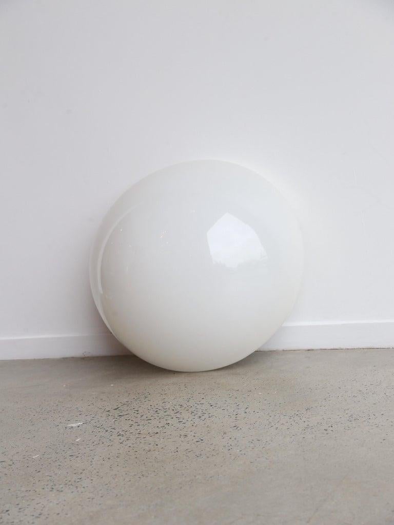 Semisfera is a beautiful wall or ceiling light designed by Italian designer Elio Martinelli in the 1970s. The name 