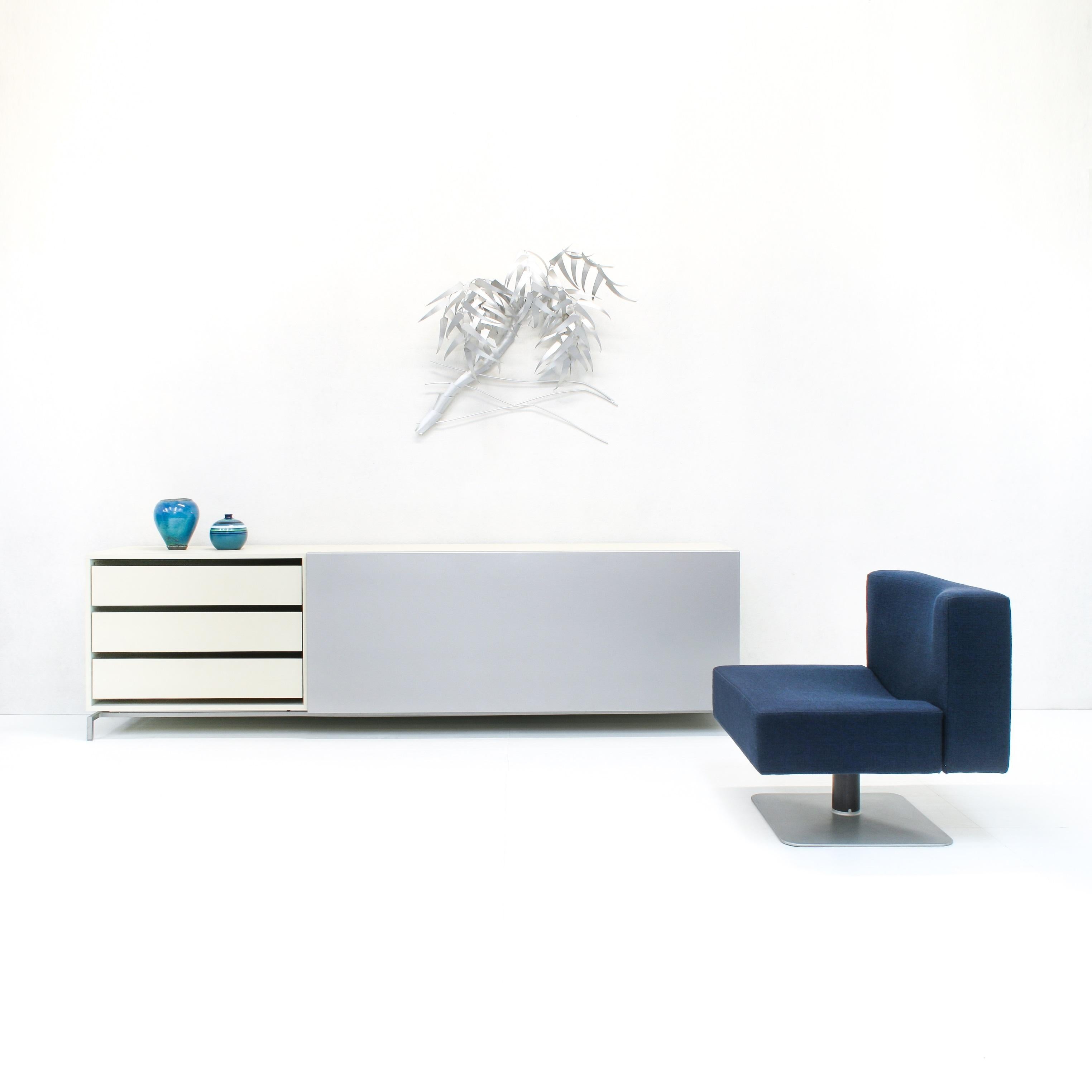 This sideboard with minimalistic lines manufactured by Pastoe Holland is made of lacquered MDF and has a large aluminum sliding door and four drawers.


Shigeru Uchida

Born in Yokohama in 1943, Shigeru Uchida is now a leading Japanese