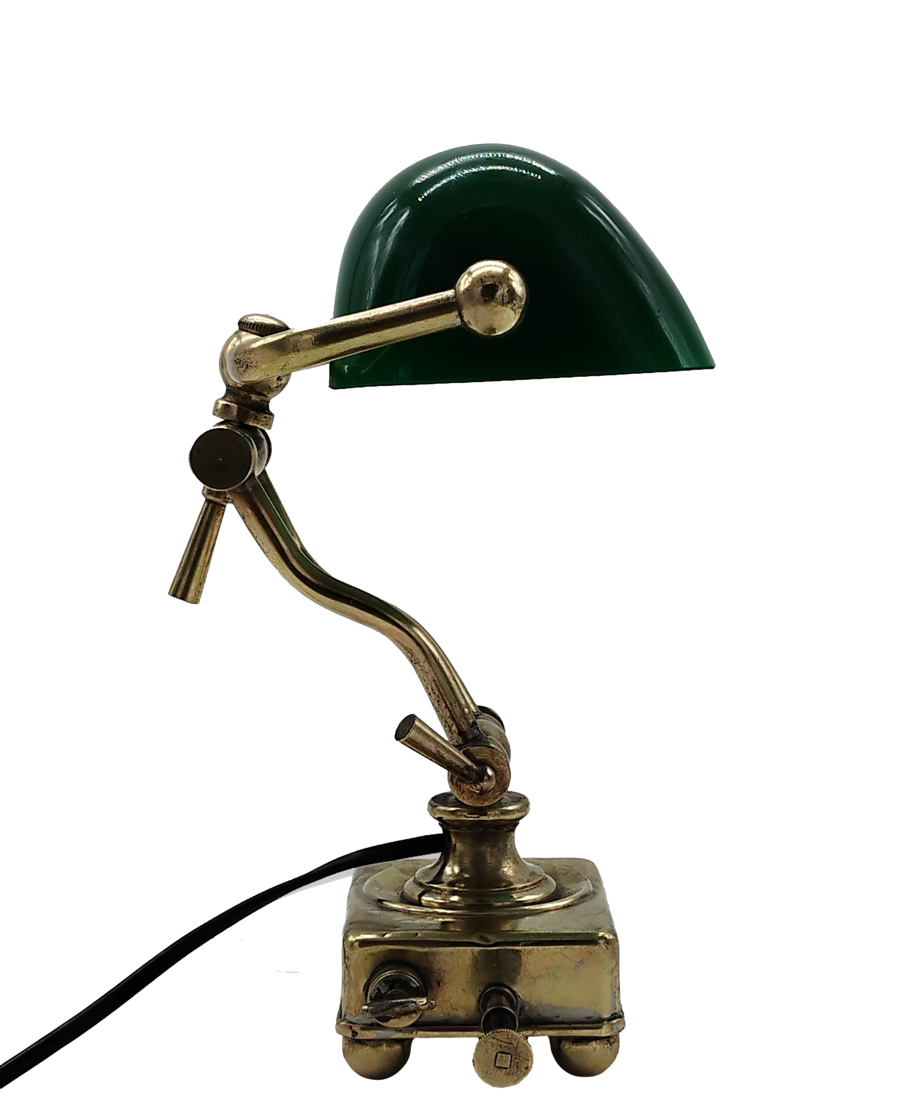Iconic and beautiful classic Ministerial lamp with green glass, desk lamp. Perfectly preserved and working with original switch. Various adjustable angles. Excellent furnishing item.
