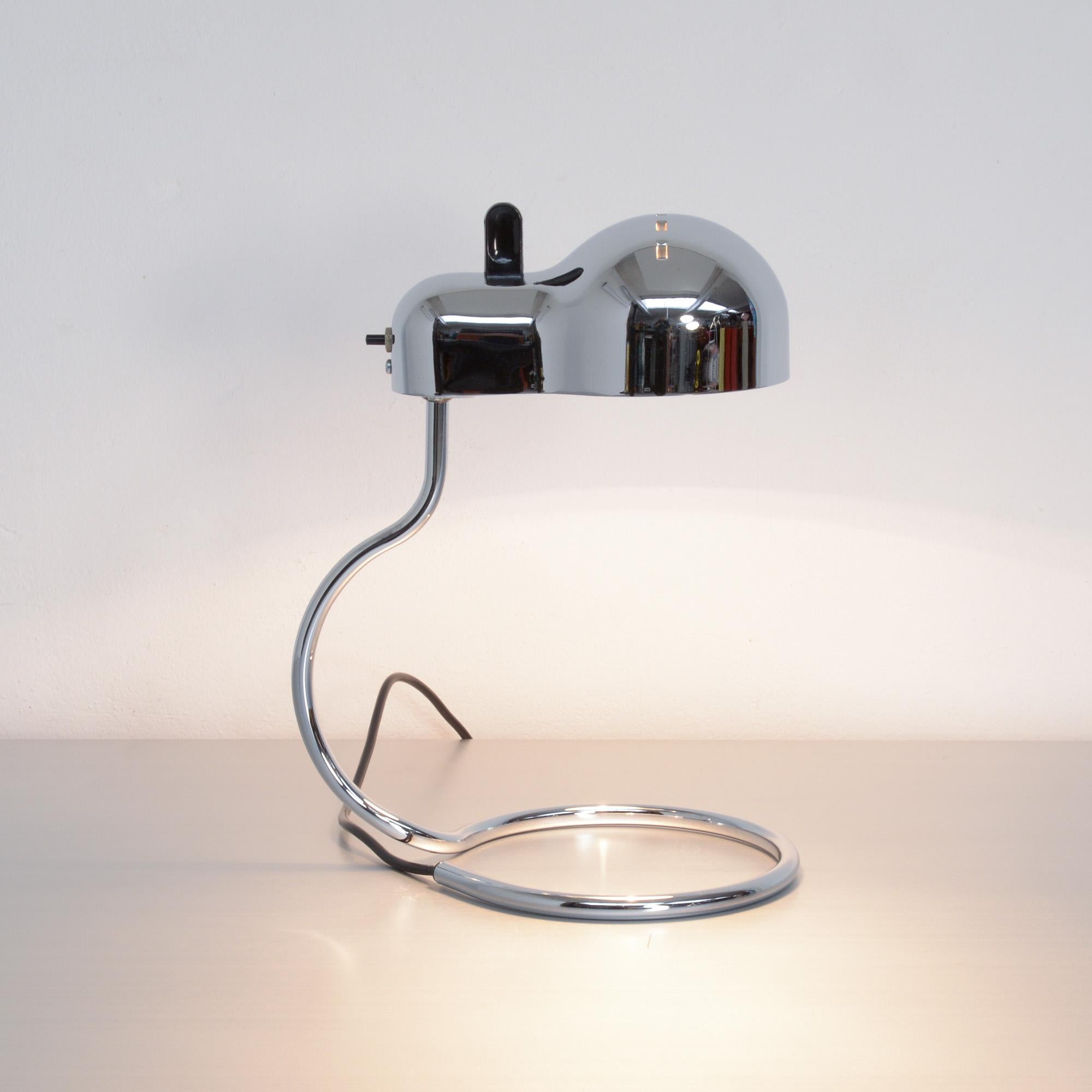 The Minitopo desk lamp was designed by Joe Colombo for Stilnovo, Italy in 1970.
This Topo in chromed metal is in very good vintage condition. The shade is turnable with the ball joint.
This old edition in chrome is hard to find, especially in this