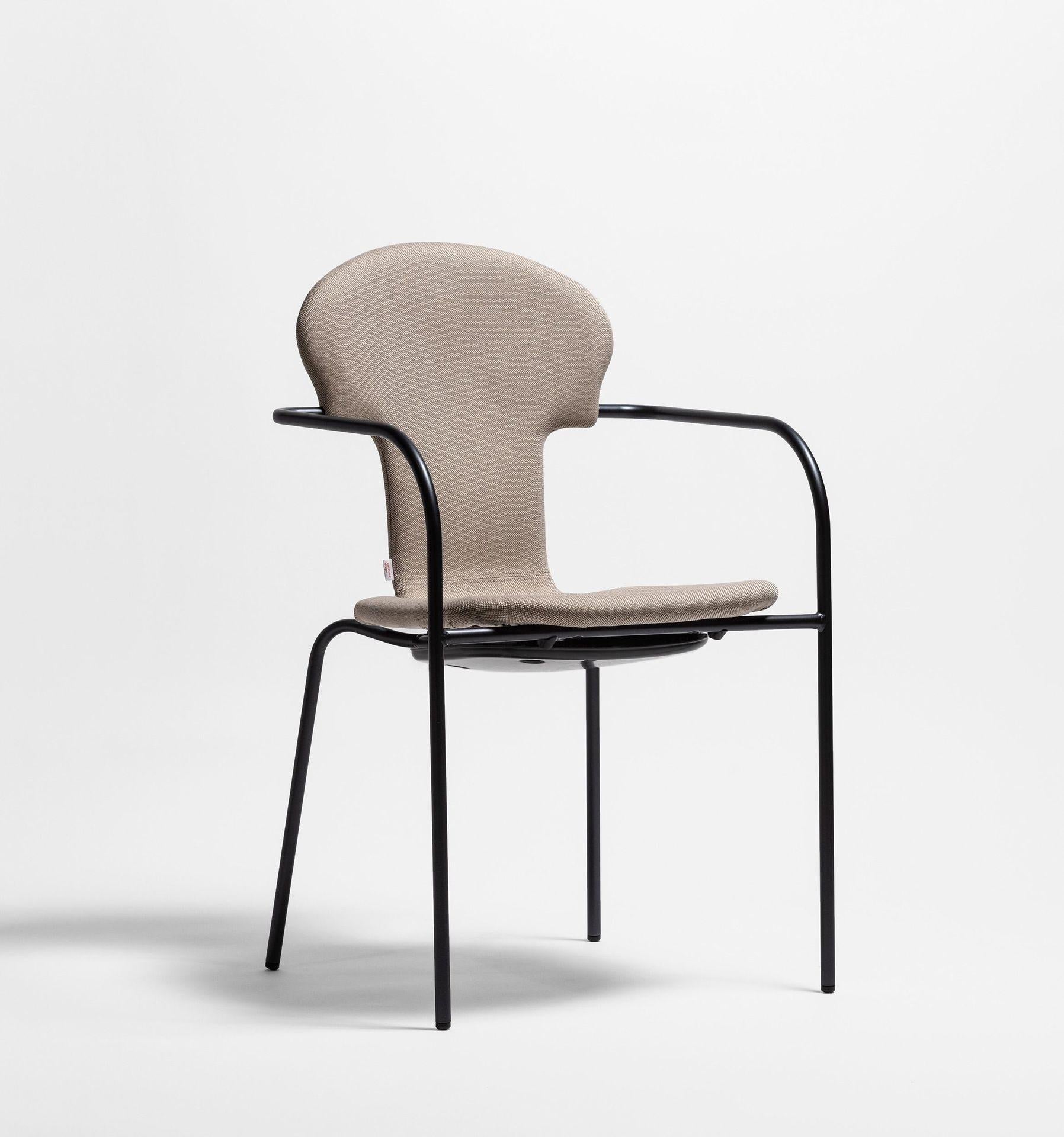 Minivarius brown chair by Oscar Tusquets
Dimensions: D 53 x W 52 x H 82 cm 
Materials: Structure in tubular steel painted in anodic black. A one-piece seat in gas injected polypropylene in black or white. Also available in an upholstered
version