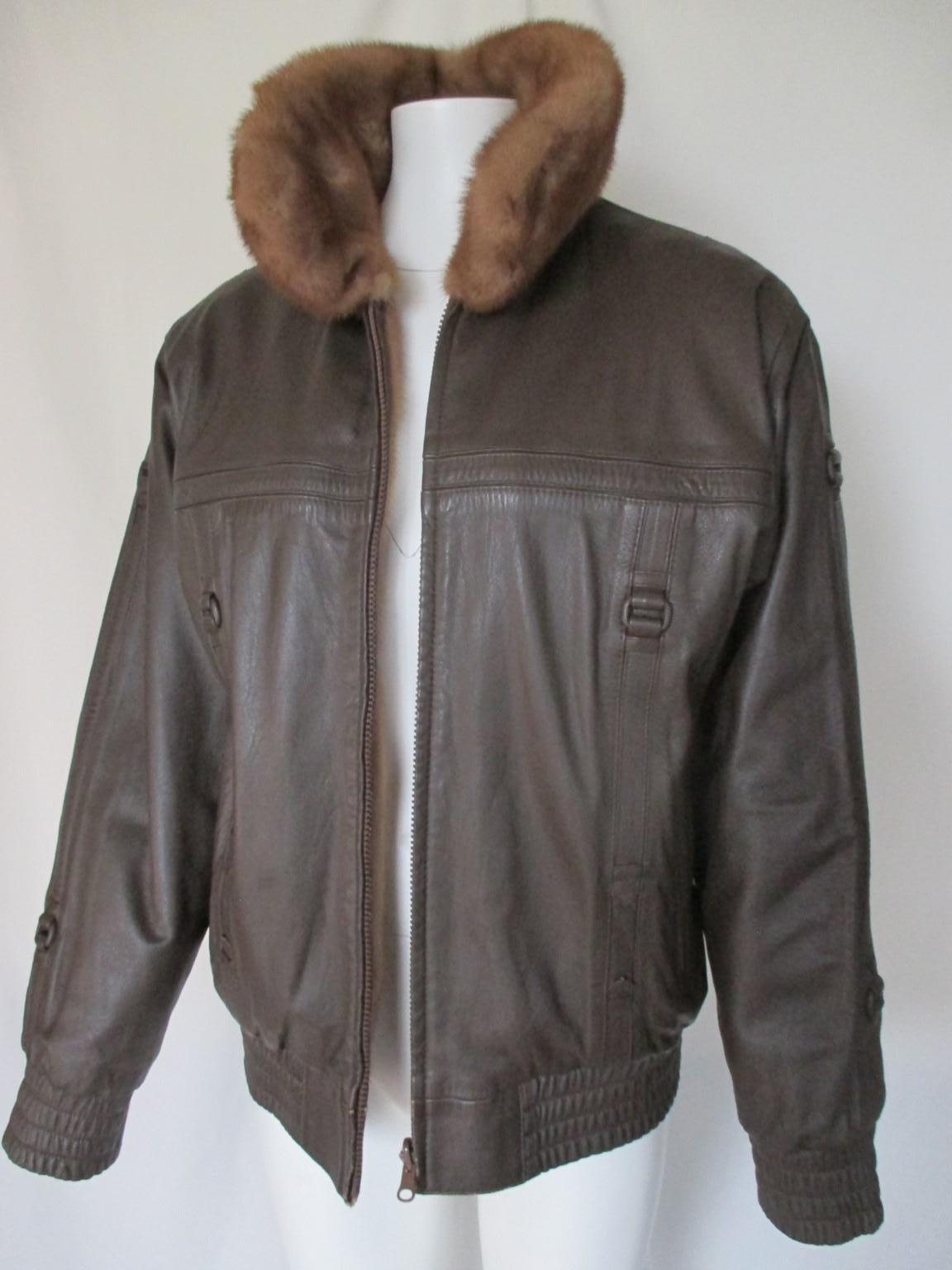 Rare mink bomber style jacket which is made of soft glossy mink fur and leather.

We offer more luxury fur items, view our frontstore.

Details:
Reversible in leather side and mink side
It has 2 side pockets from both sides and a zipper front