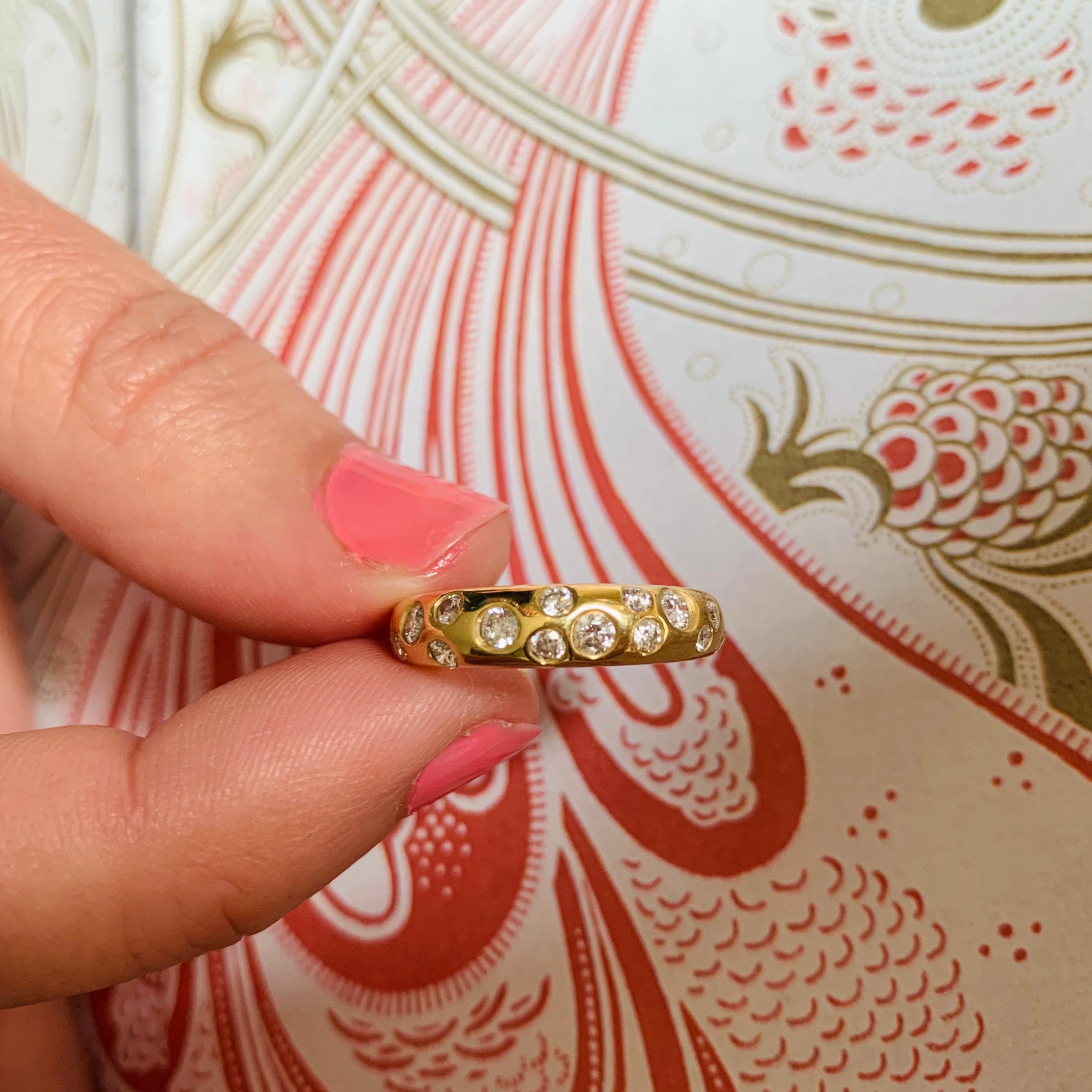 Gorgeous eye catching 18 karat yellow gold ring set with a scattering of diamonds in a domed band ring. 

- Ring size: 6 (L) complimentary resizing on request
- 18 karat yellow gold 

About Minka Jewels

Founded by gemologist Lucy Crowther, Minka