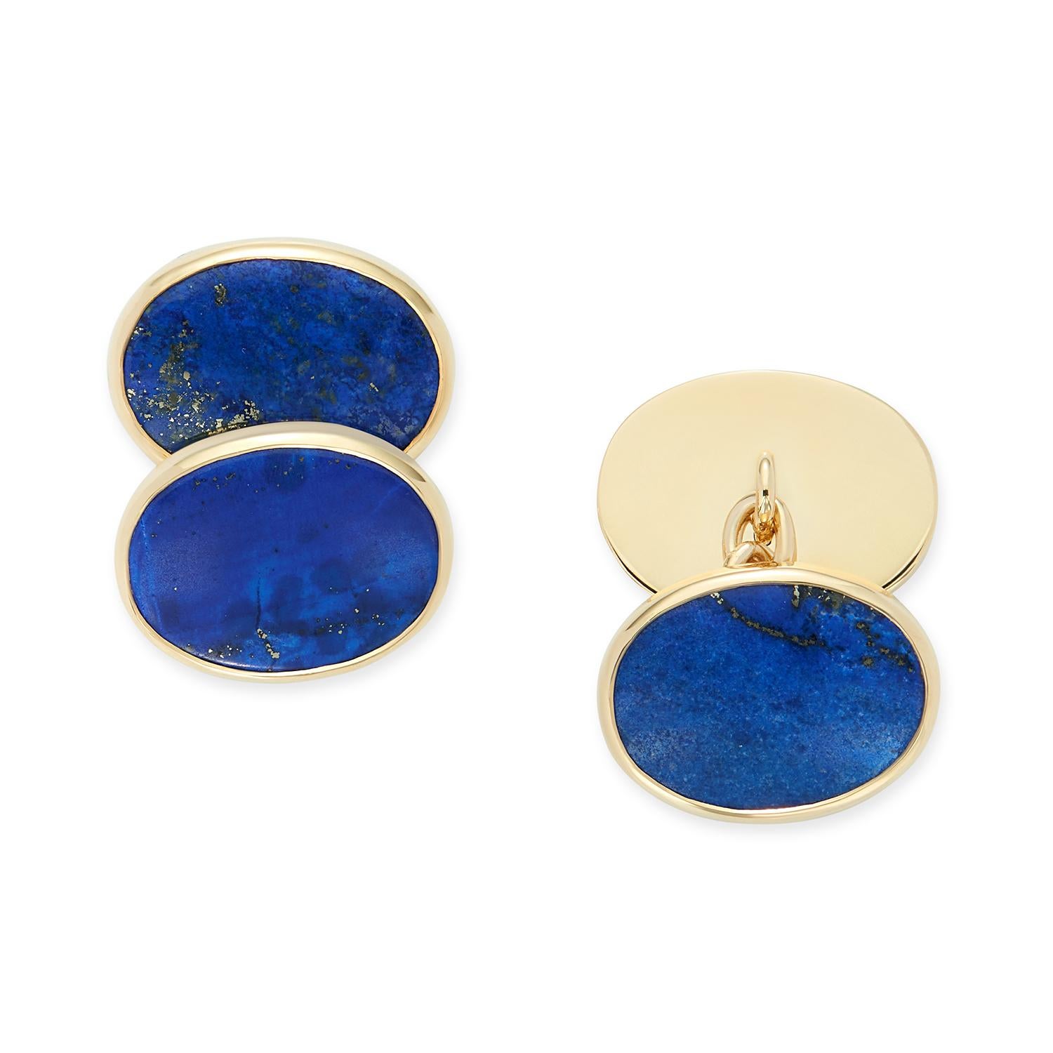 A pair of striking Lapis Lazuli cufflinks set in 18 karat yellow gold with full gold back and chain links. The vibrant blue of this beautiful Lapis is eye-catching and set off beautifully by the yellow gold. 
Natural Lapis with natural inclusions