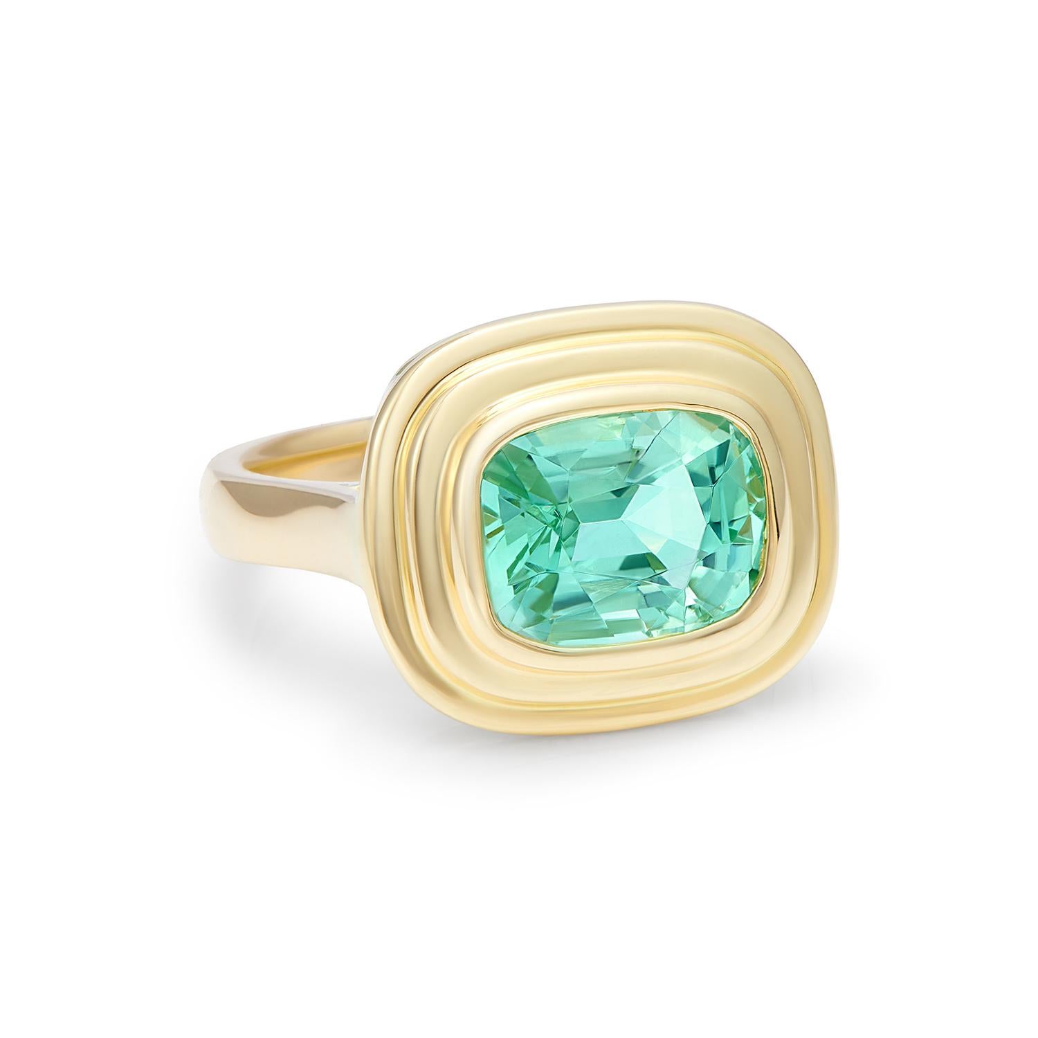 18kt Yellow Gold
Tourmaline

One-of-a-kind, 2.70ct Tourmaline set into the Athena setting

Ring size M 1/2 (USA 6 1/2) - Complimentary ring sizing on request

2.70 carat blue/green Tourmaline set in 18 karat yellow gold. This beautiful neon