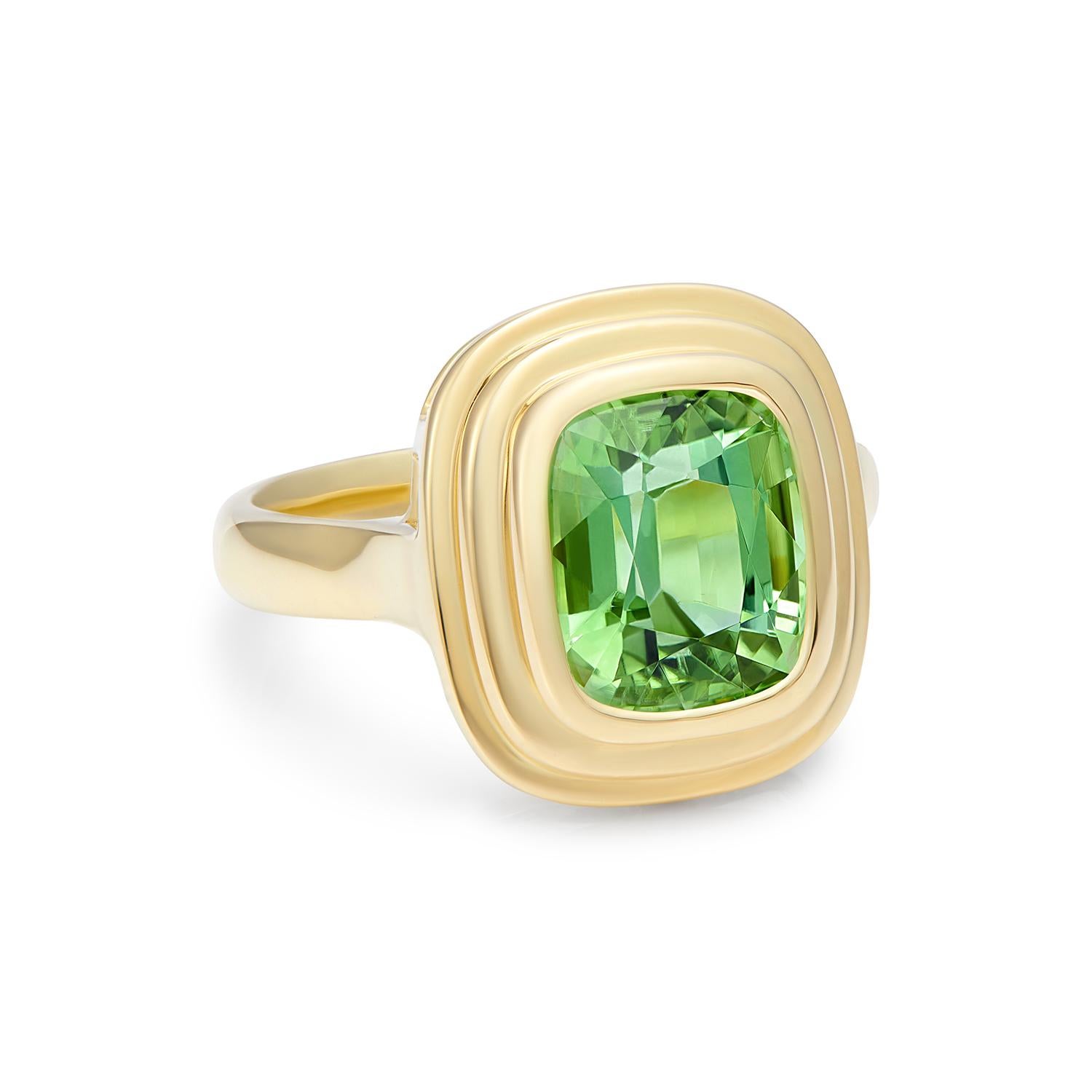 3.51 carat Green Tourmaline ring set in 18 karat yellow gold. This beautiful green Tourmaline is a vivid green colour in a wonderful statement size, forever changing in different lights. Each piece of this collection is unique due to the rarity of