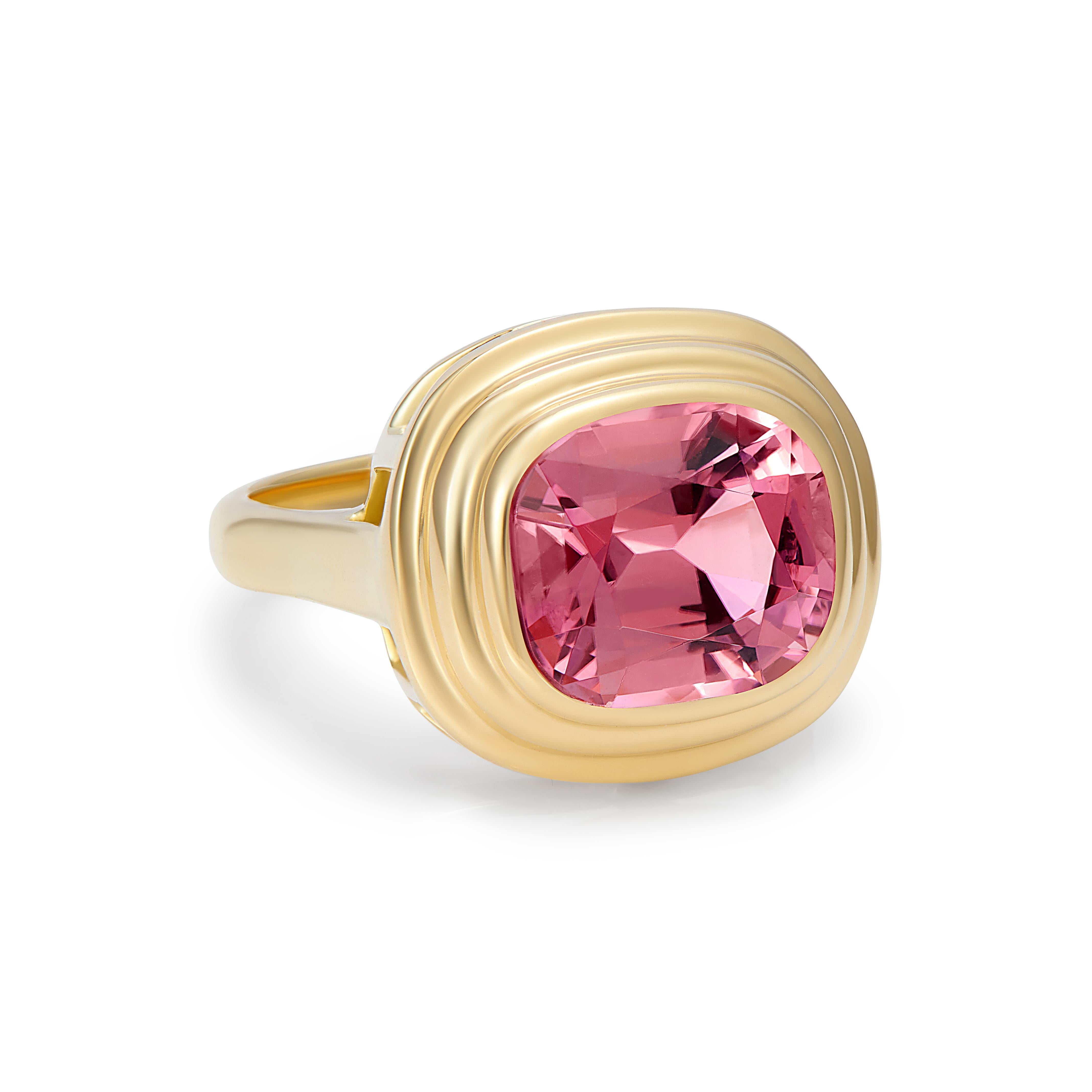  4.80ct Pink Tourmaline ring set in 18 karat yellow gold. This beautiful pink Tourmaline is a beautiful colour and in a wonderful statement size, forever changing in different lights. Each piece of this collection is unique due to the rarity of the