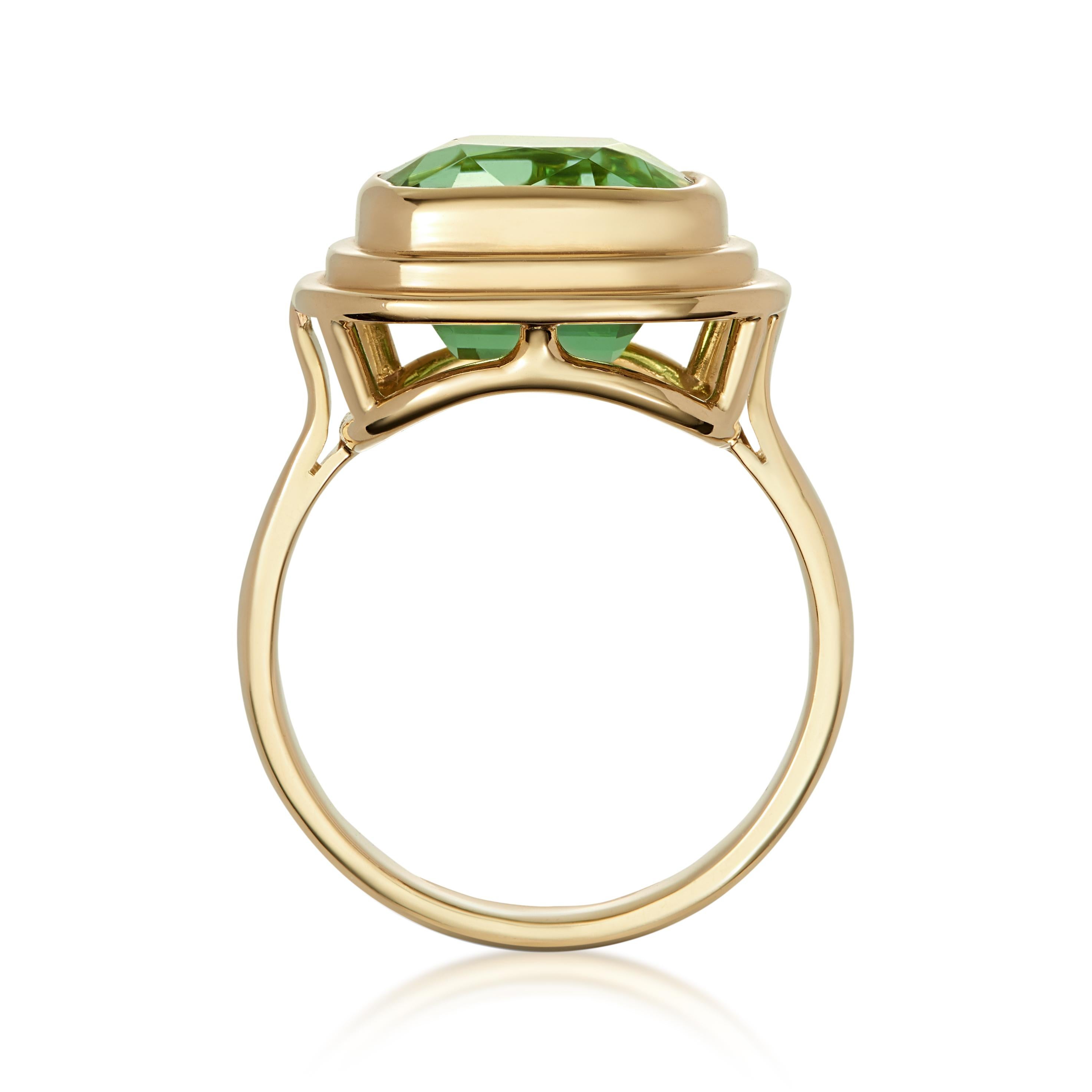 Striking vivid green 5.70 carat Tourmaline set into 18 karat yellow gold, Athena ring. 
Tourmaline comes in a variety of colours, green being the most popular and this gorgeous stone is a brilliant and bright Tourmaline, such an eye catching colour.