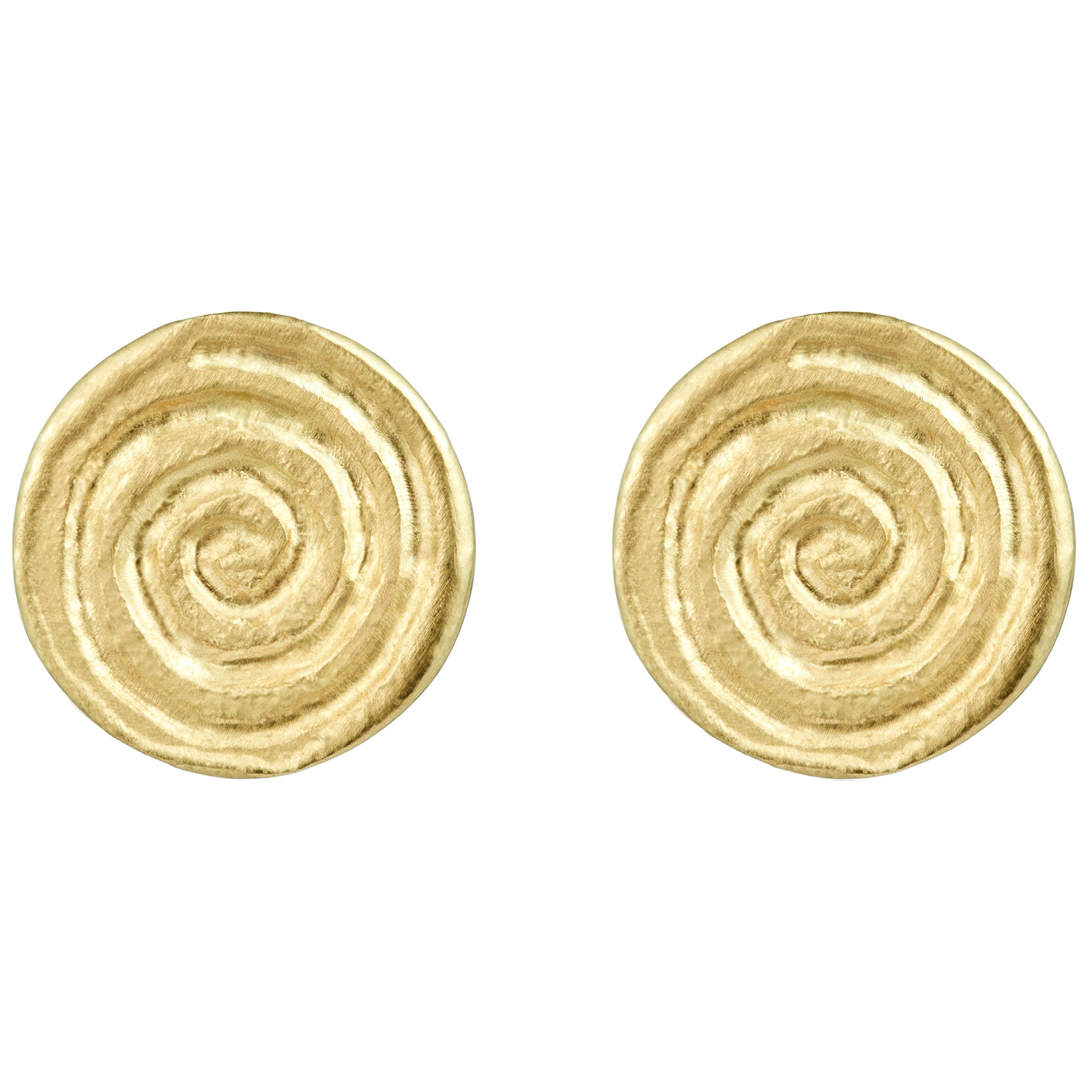 A sophisticated pair of 18 karat yellow gold stud earrings, hand-engraved with the symbol of infinity and life with additional drop attachments for a more dressed up look. These unique statement earrings are perfect for weddings & special