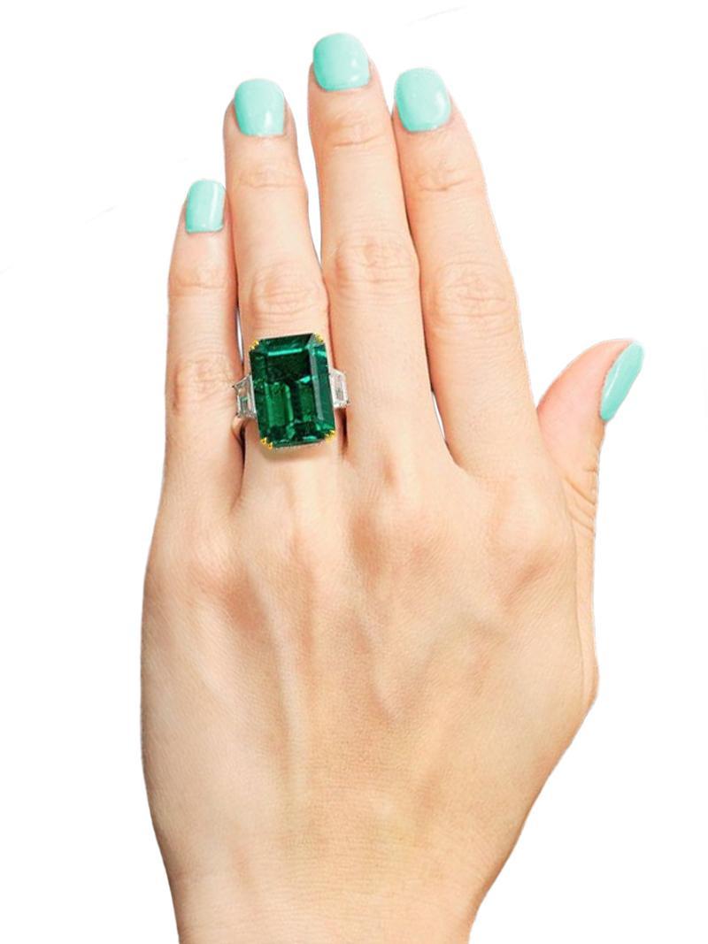Elevate your style with this extraordinary ring, meticulously crafted in Italy and featuring a 16 carat emerald cut emerald, certified by GIA as minor oil. The mesmerizing green hue of the emerald, cut in an elegant emerald shape, is a true