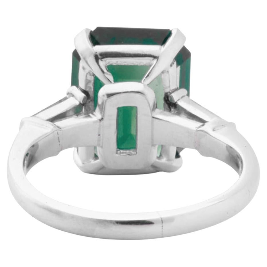 Stunning 3.14 carat green emerald diamond set in platinum
two side tapered cut diamonds d/e color 
the ring can be resized if required
GIA certified 