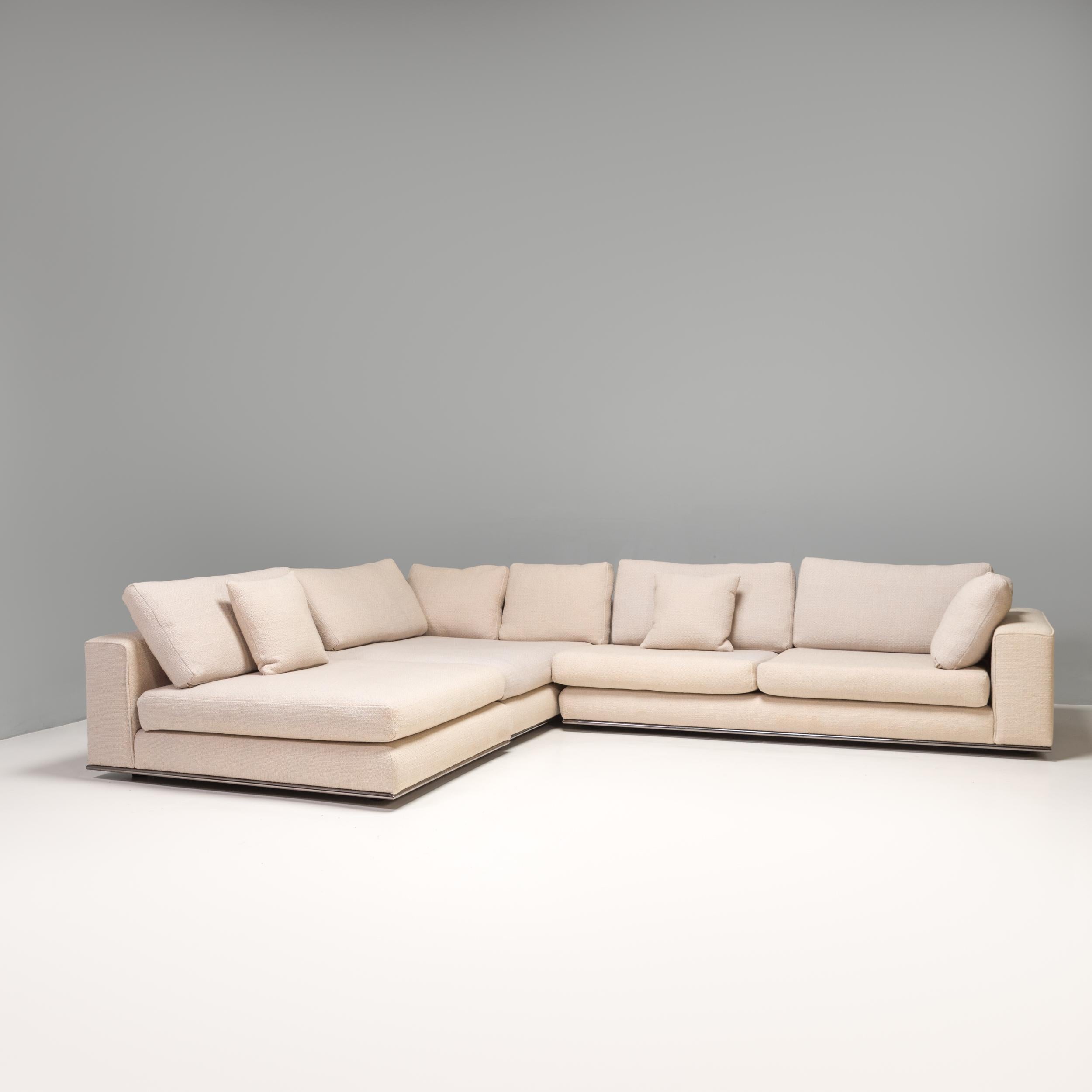 Designed by Rodolfo Dordoni for Minotti, the Andersen Line sofa formed part of the 2010 Senza Tempo Collection and embodies timeless Italian design.

Fully upholstered in beige textured wool linen boucle, the sofa has a modern linear silhouette