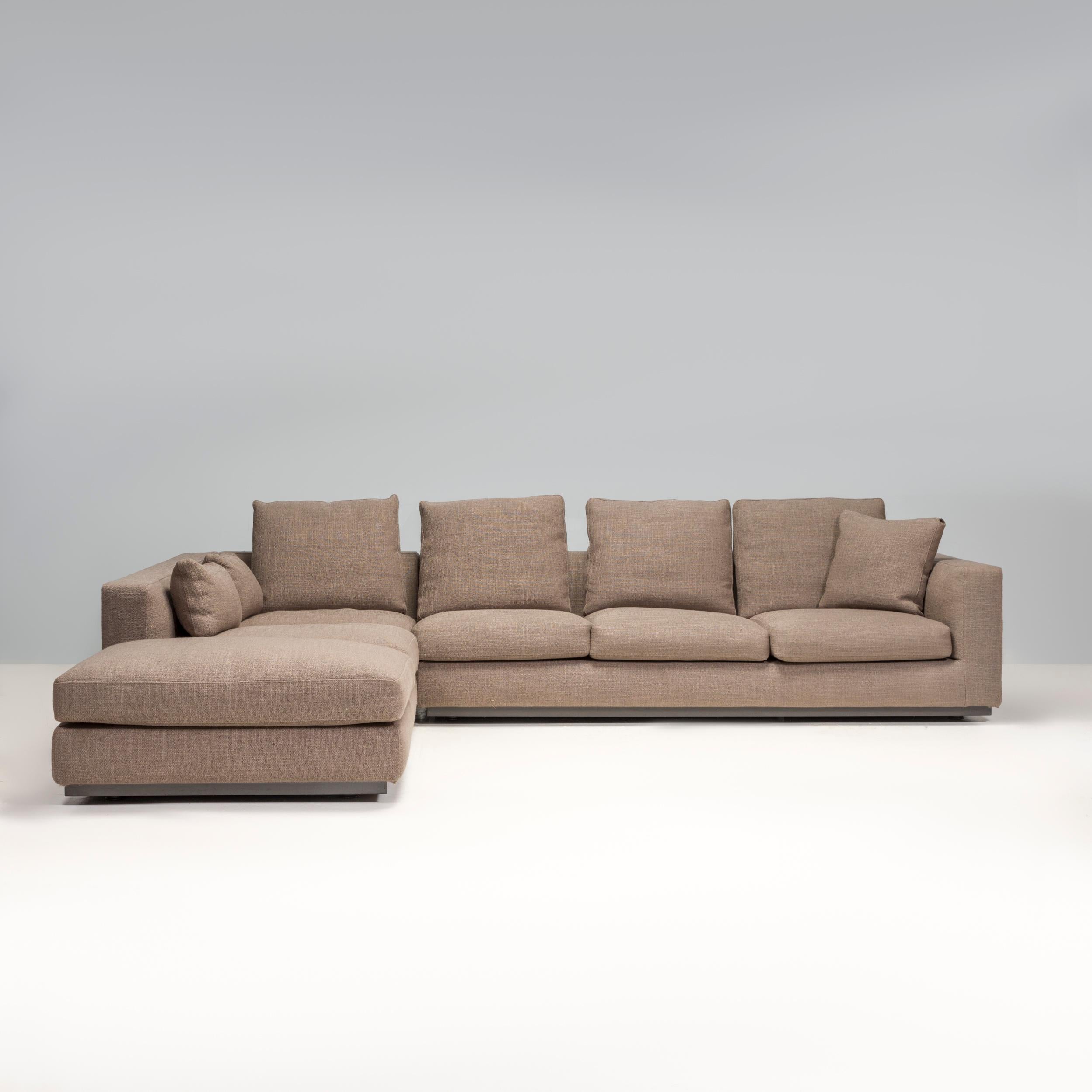 Designed by Rodolfo Dordoni for Minotti, the Andersen Line sofa formed part of the 2010 Senza Tempo Collection and embodies timeless Italian design.

Fully upholstered in grey fabric, the sofa has a modern linear silhouette sitting on a metal base