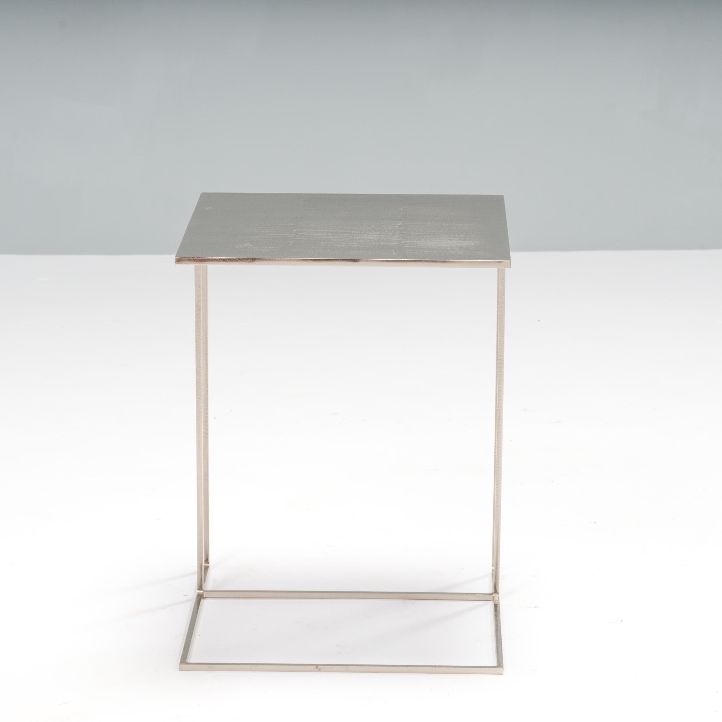 Designed by Rodolfo Dordoni for Minotti, the Leger side table formed part of the 1998 Collection which celebrated simple, elegant shapes and linear style.

Constructed from brushed steel, this side table has a sleek silhouette.

The cantilever