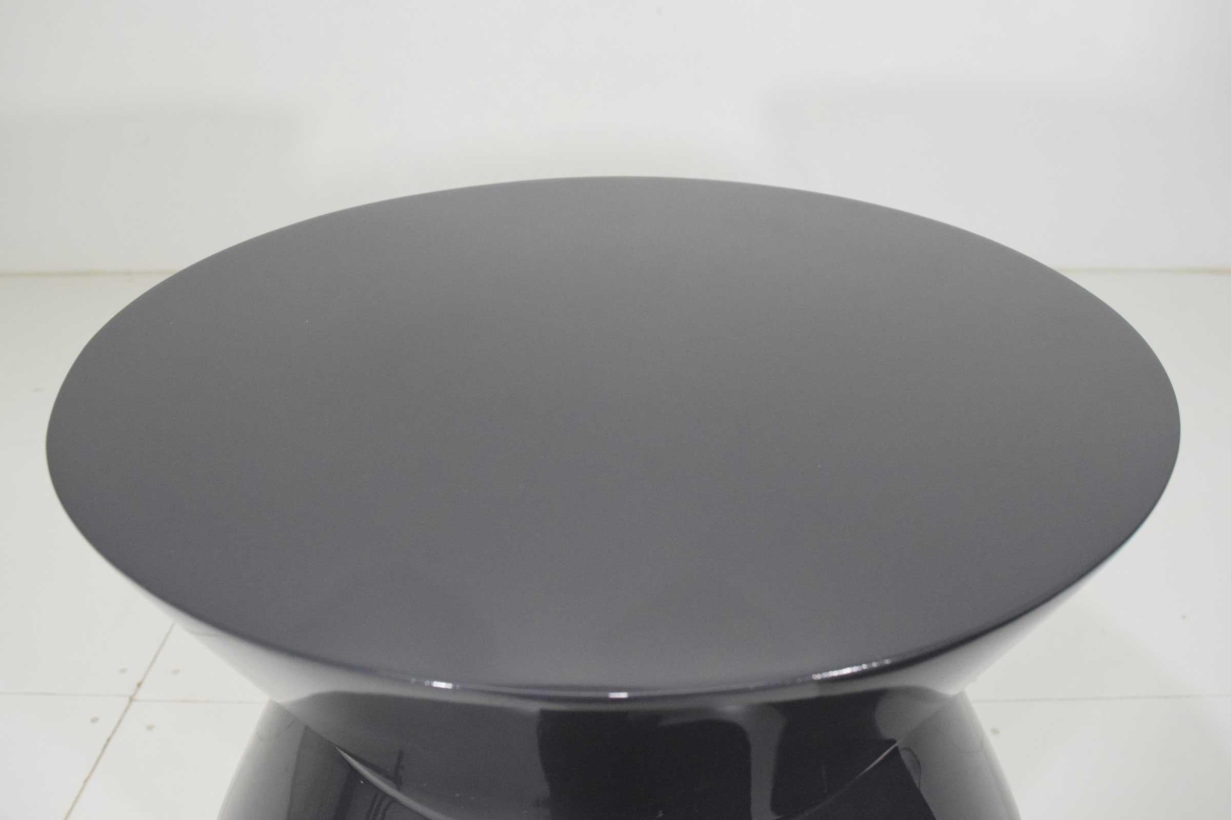 Newly refinished in a dark grey lacquer, this table is substantial. High gloss finish.